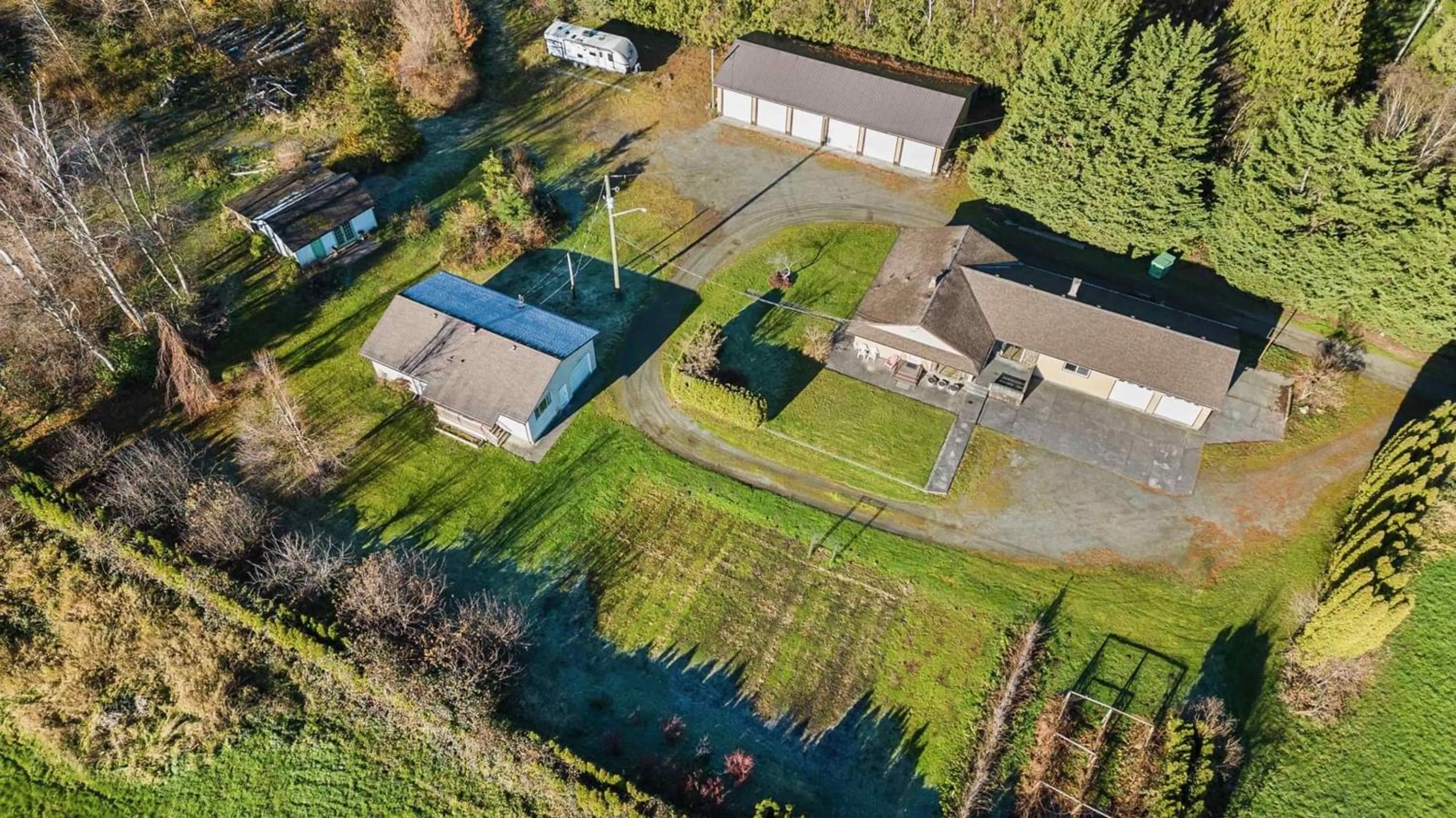 Frontside or backside of a home, the fenced backyard for 2689 SUTHERLAND ROAD, Agassiz British Columbia V0M1A1