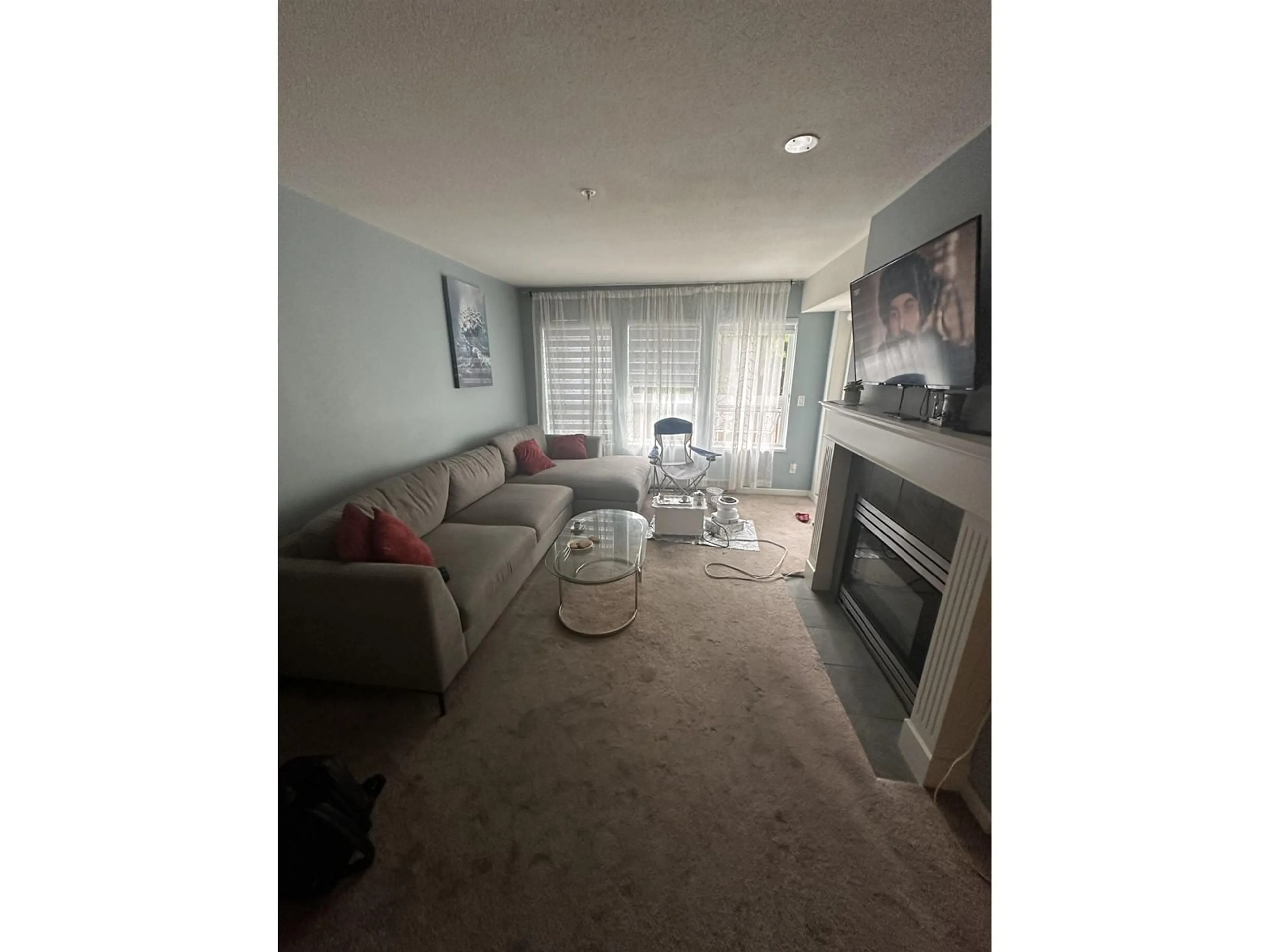 A pic of a room, carpet floors for 210 9668 148 STREET, Surrey British Columbia V3R0W2