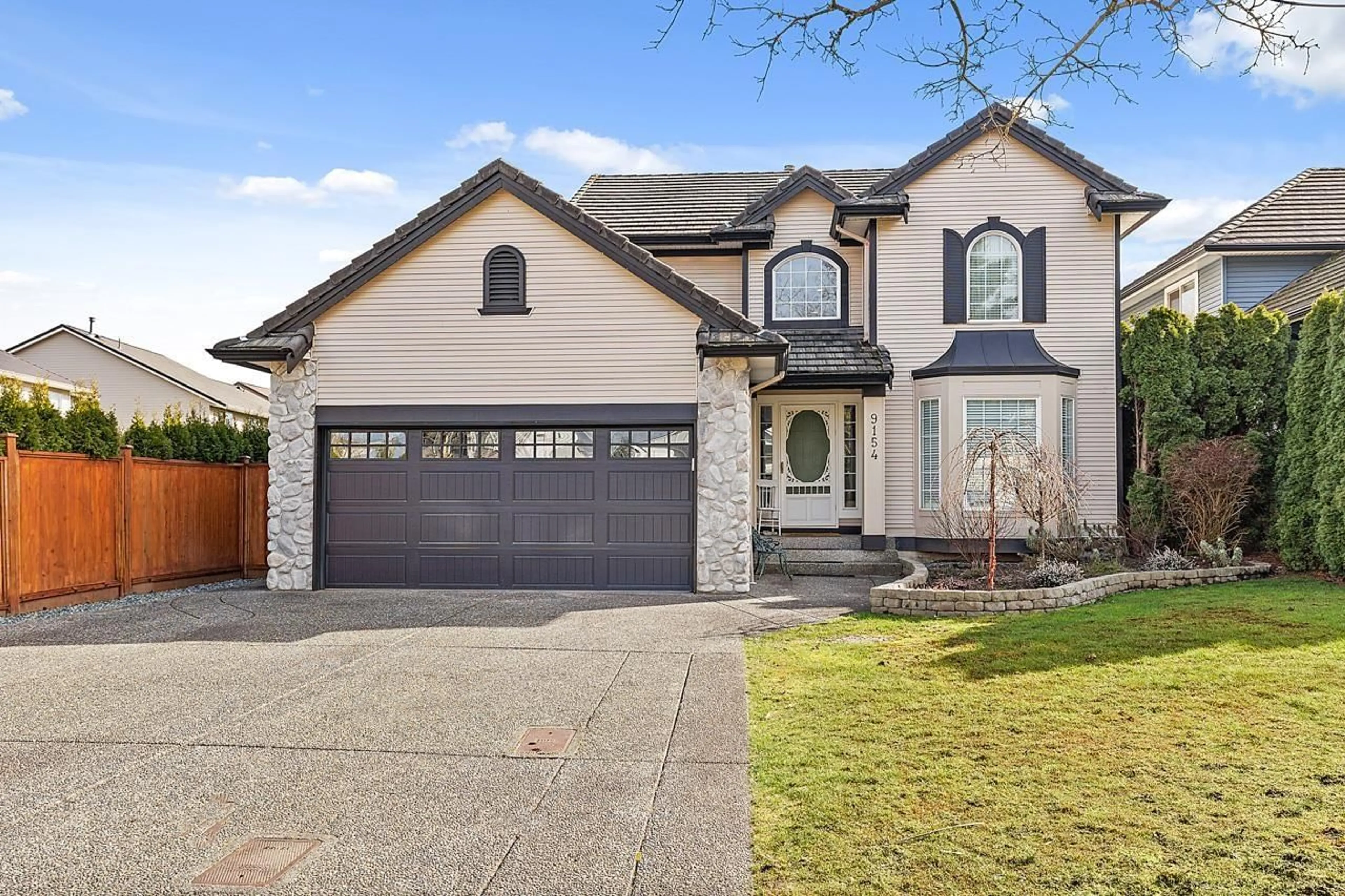 Frontside or backside of a home for 9154 202B STREET, Langley British Columbia V1M3Y2