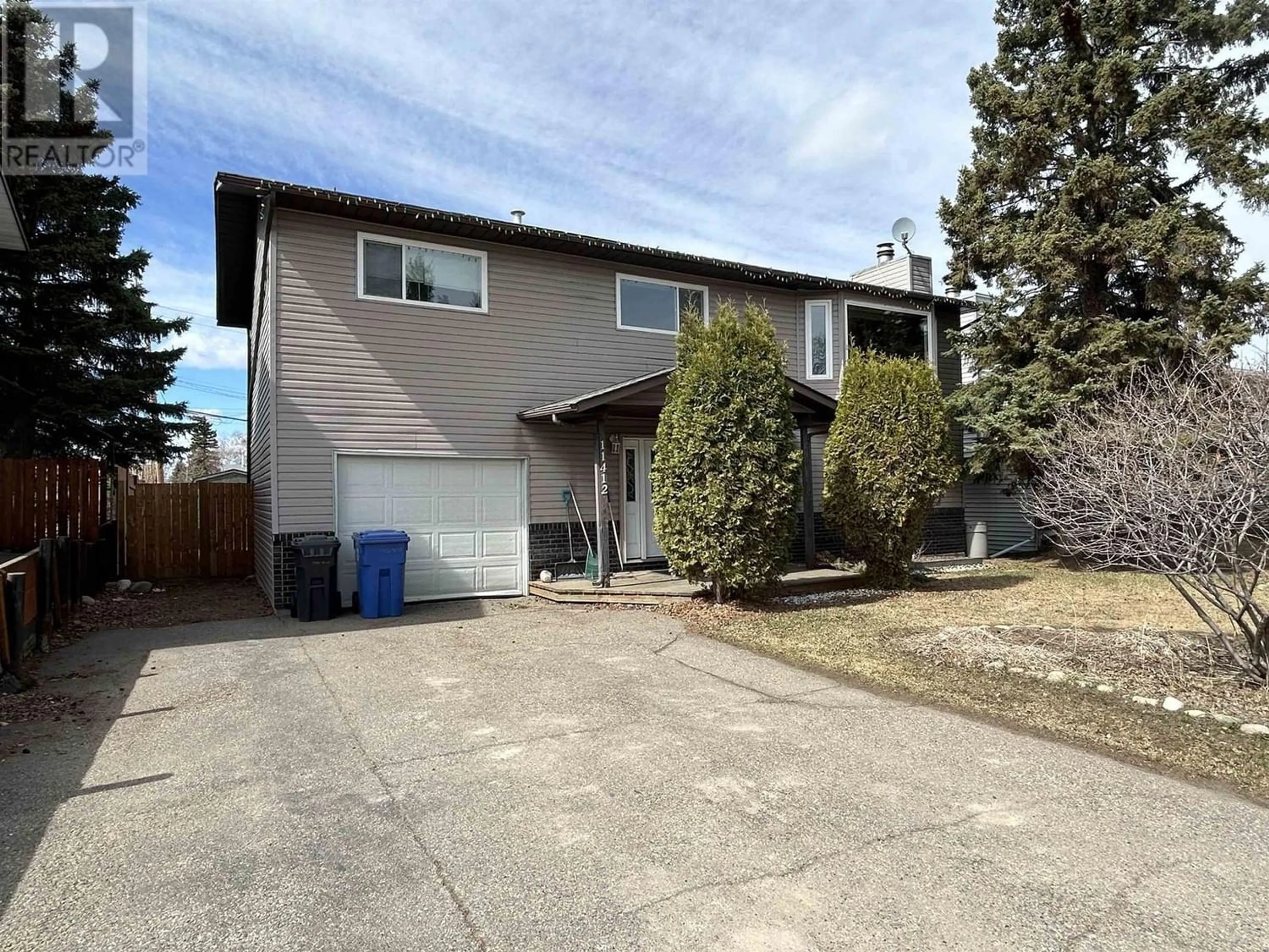 Frontside or backside of a home for 11412 92 STREET, Fort St. John British Columbia V1J4Y3