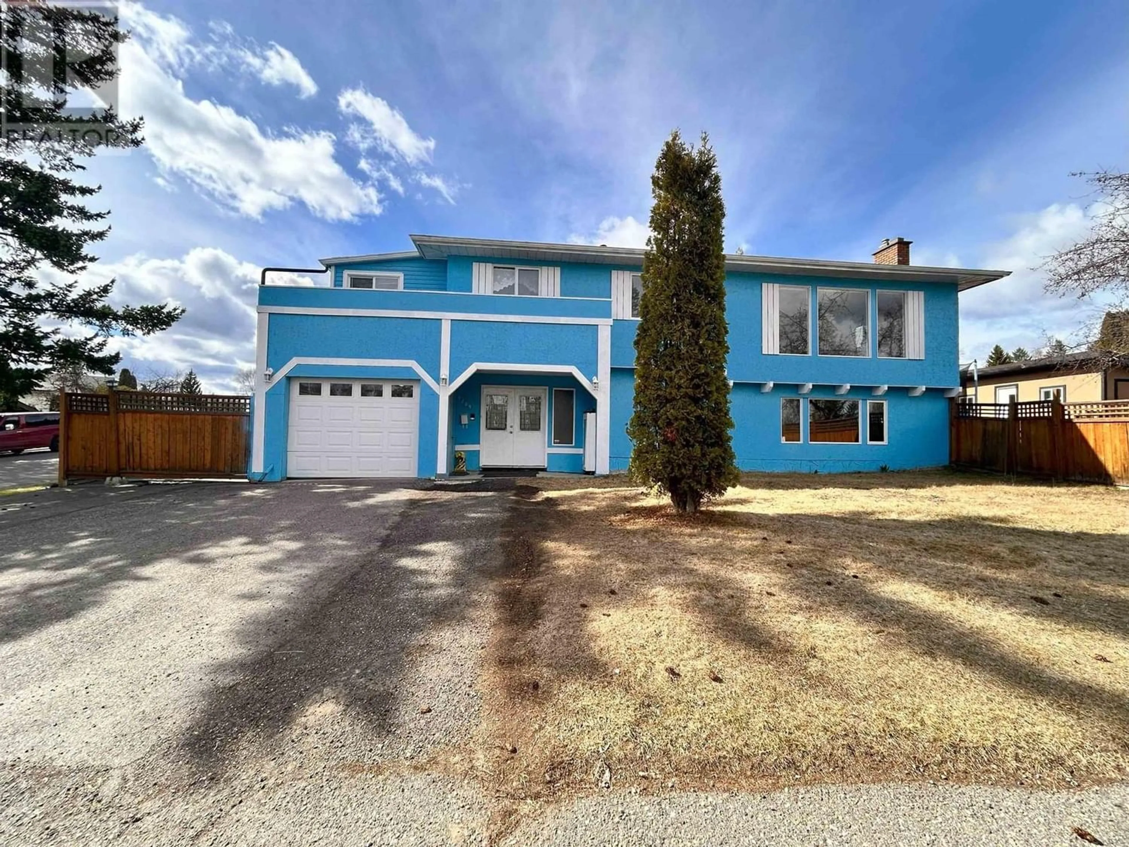 Frontside or backside of a home for 1209 OSPIKA BOULEVARD, Prince George British Columbia V2M6P8