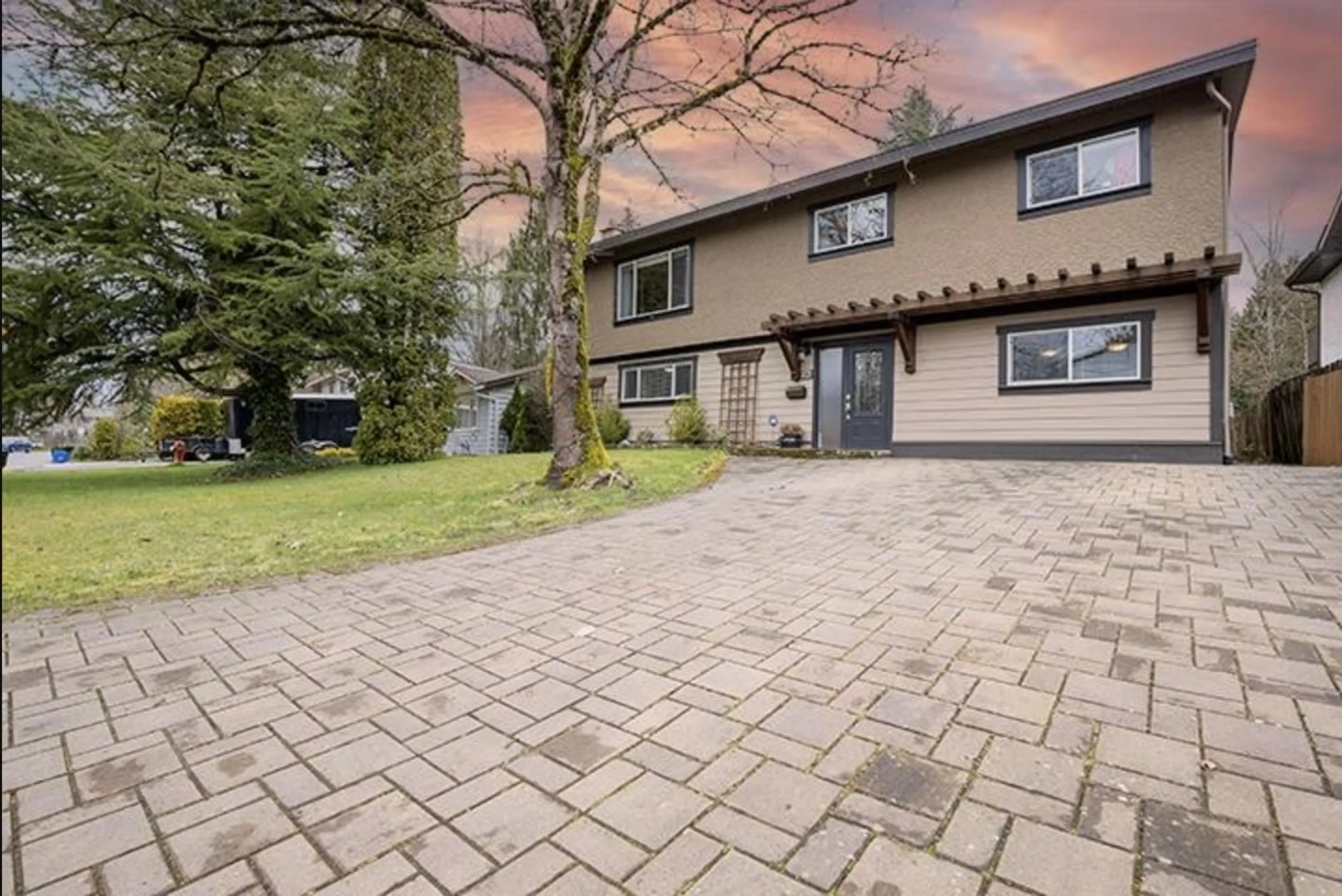 Frontside or backside of a home for 4986 205A STREET, Langley British Columbia V3A5P9