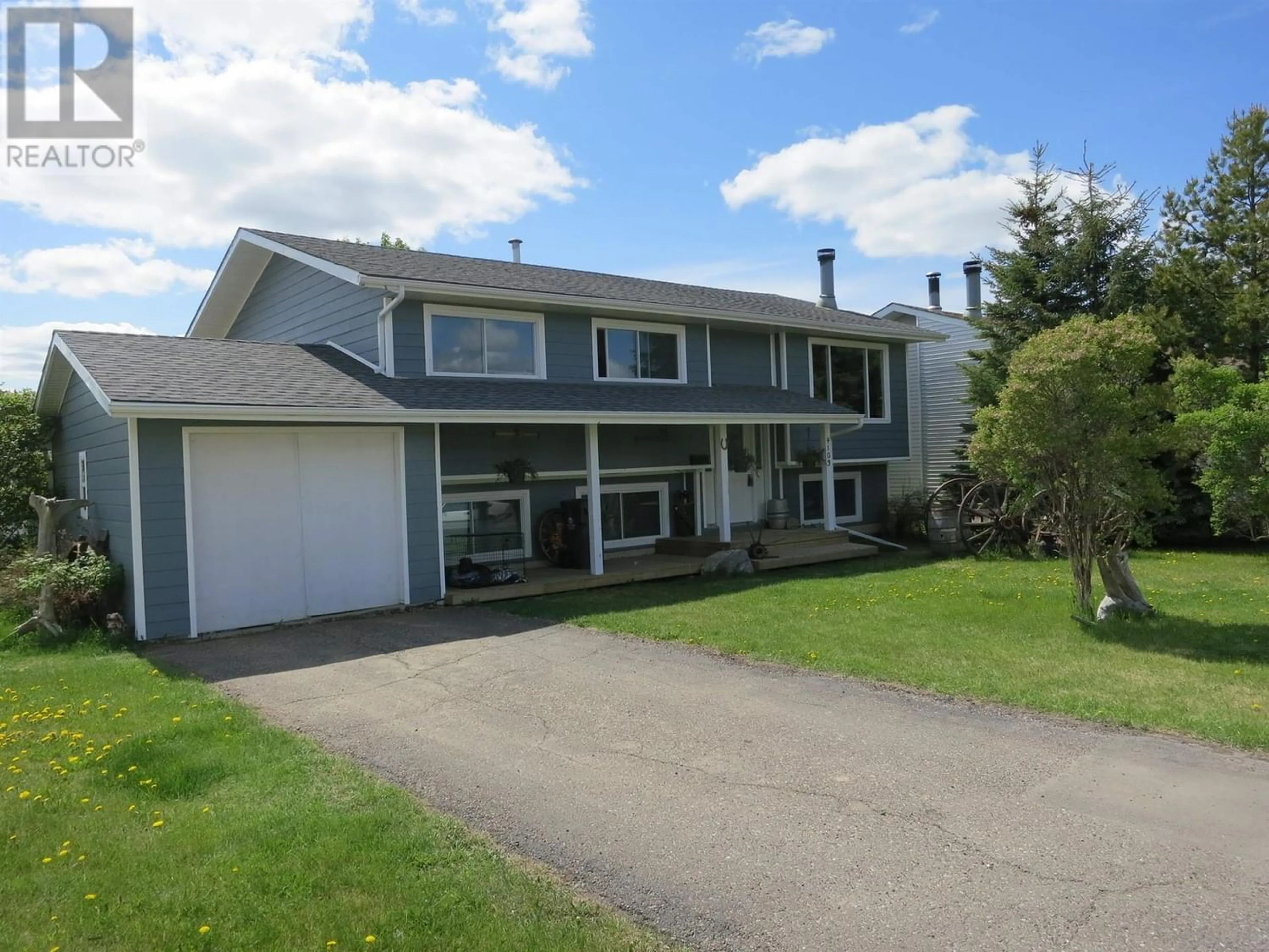 Frontside or backside of a home for 9103 98A AVENUE, Fort St. John British Columbia V1J5G8