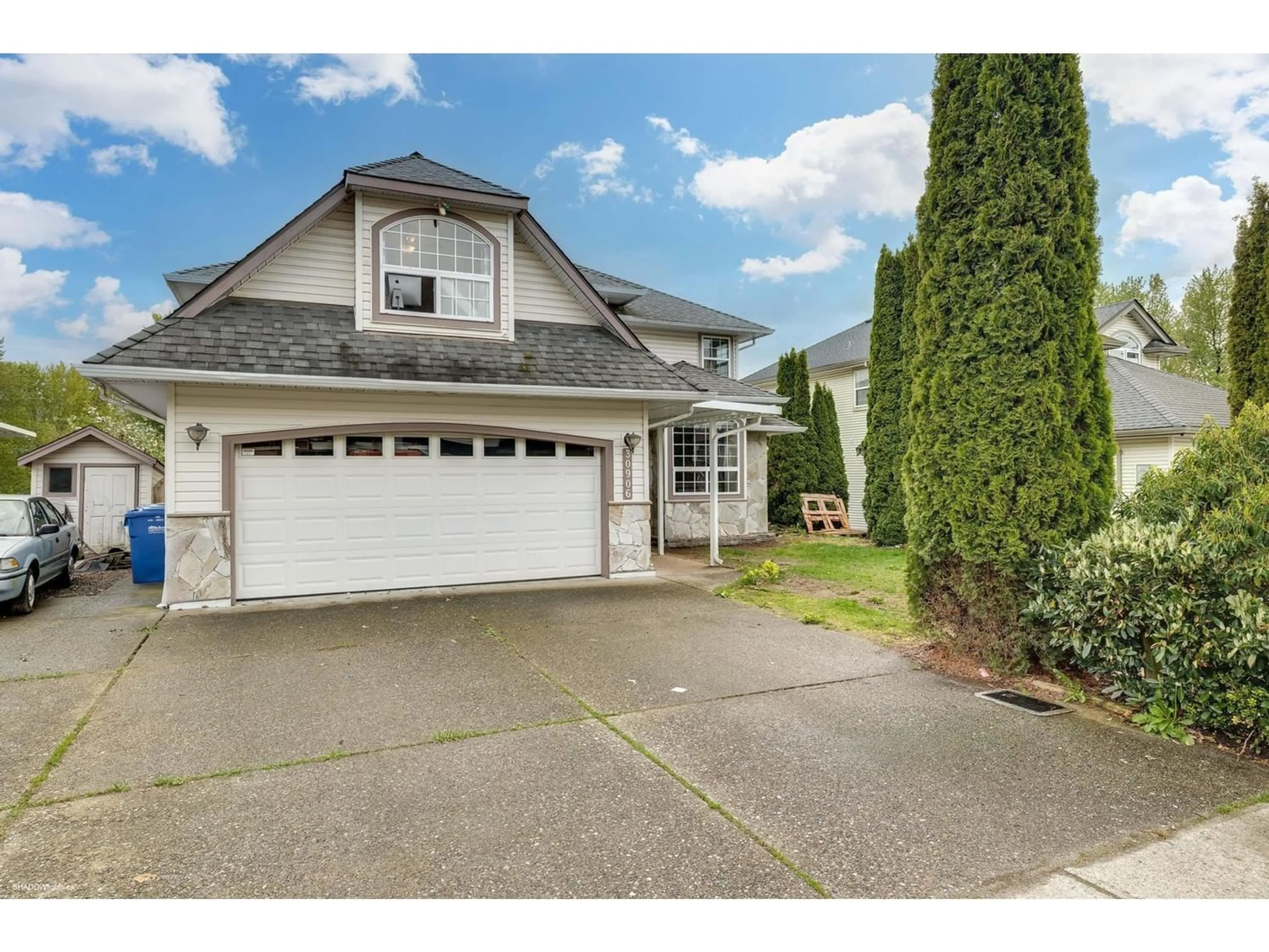 Frontside or backside of a home for 30906 SANDPIPER DRIVE, Abbotsford British Columbia V2T5L6