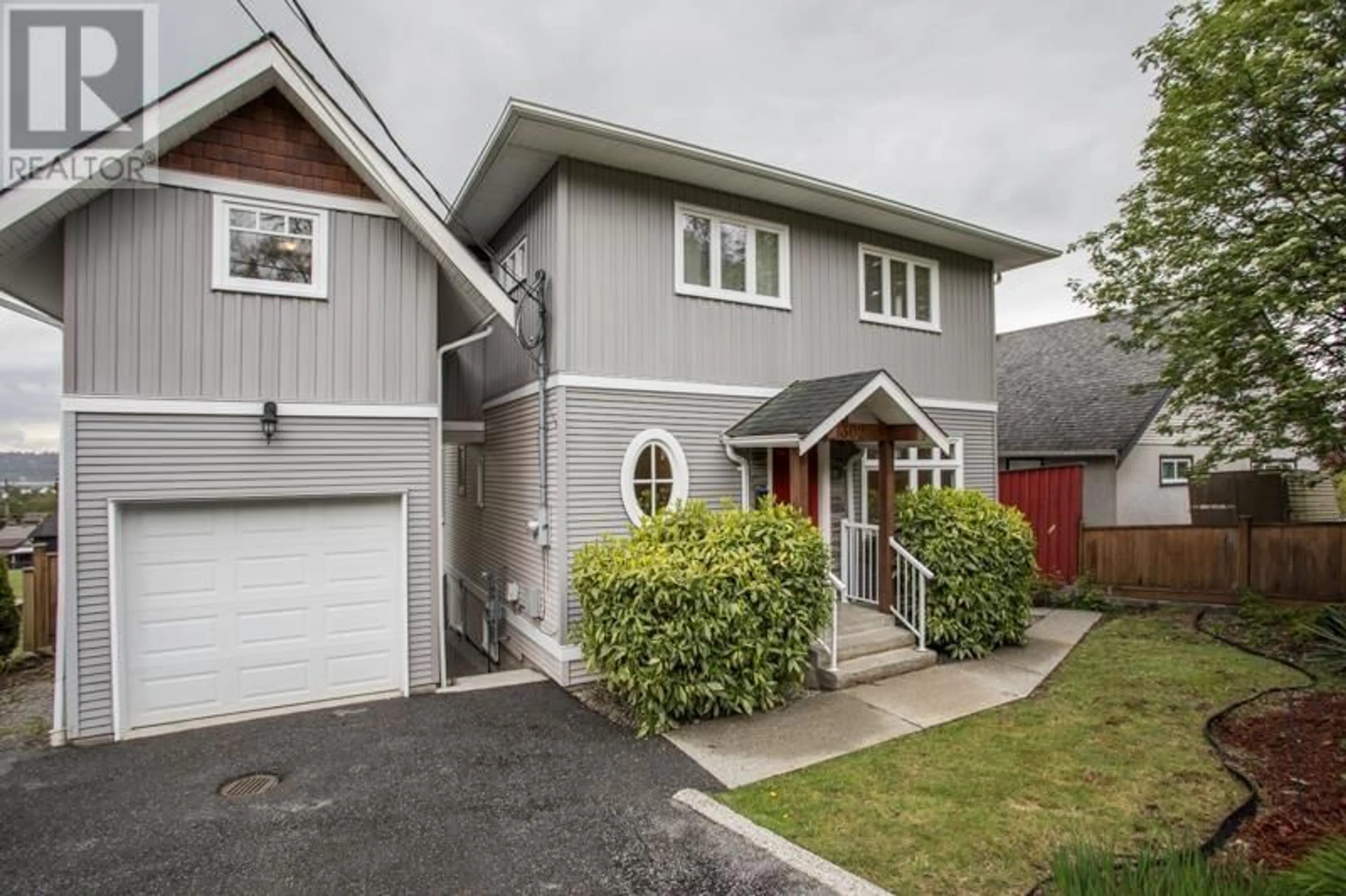 Frontside or backside of a home for 1302 HAMMOND AVENUE, Coquitlam British Columbia V3K2P3