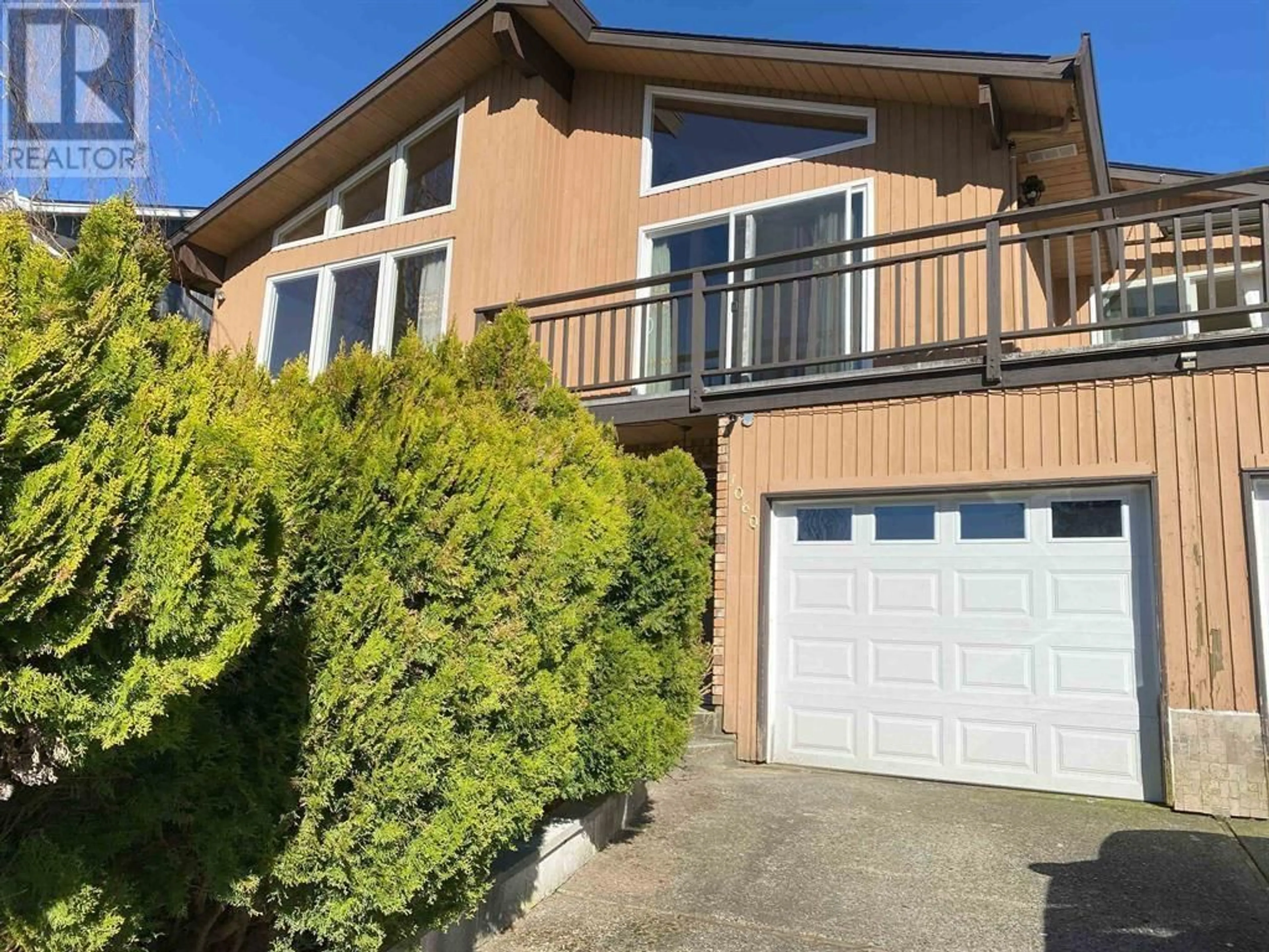 Frontside or backside of a home for 1060 AYSHIRE DRIVE, Burnaby British Columbia V5A4A1
