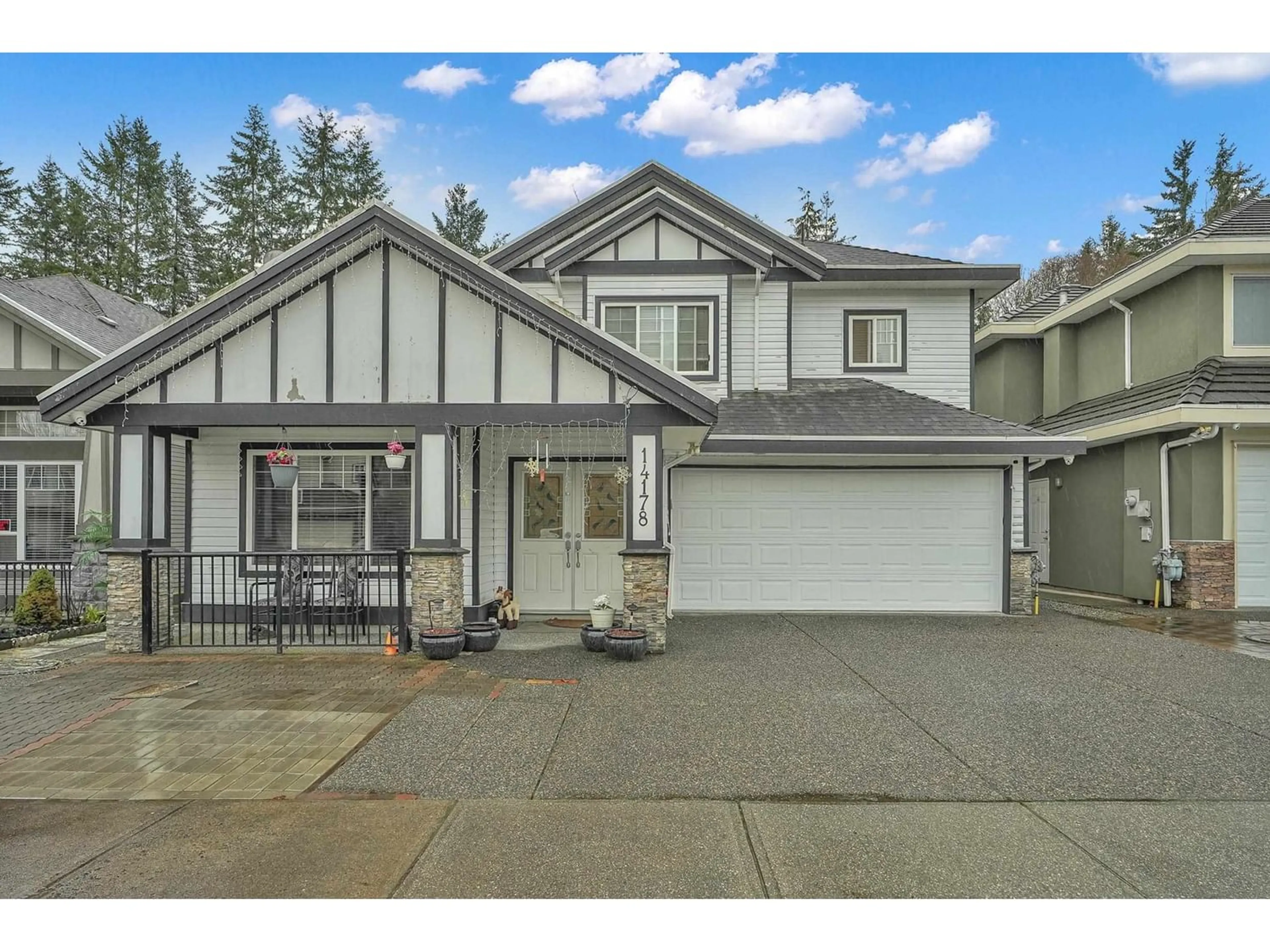 Frontside or backside of a home for 14178 64A AVENUE, Surrey British Columbia V3W1R5