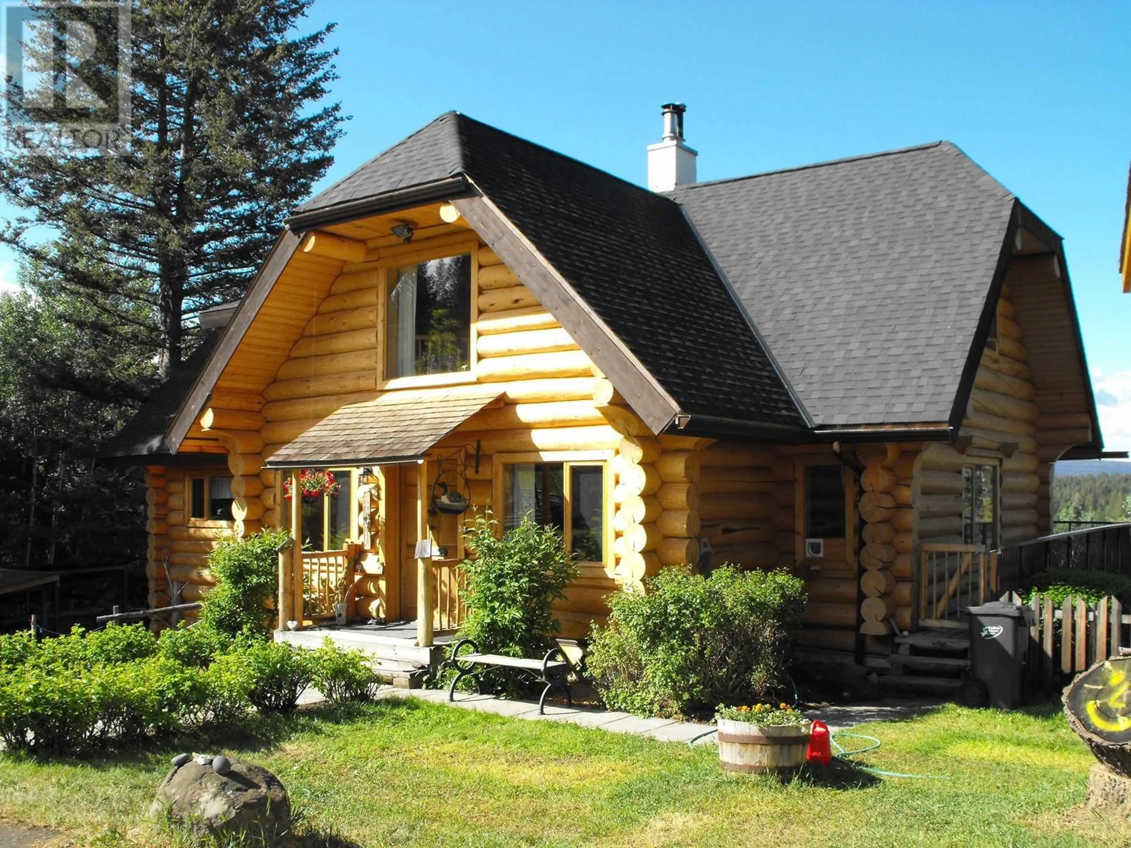 A pic from outside/outdoor area/front of a property/back of a property/a pic from drone, water/lake/river/ocean view for 4768 TELQUA DRIVE, 108 Mile Ranch British Columbia V0K2Z0