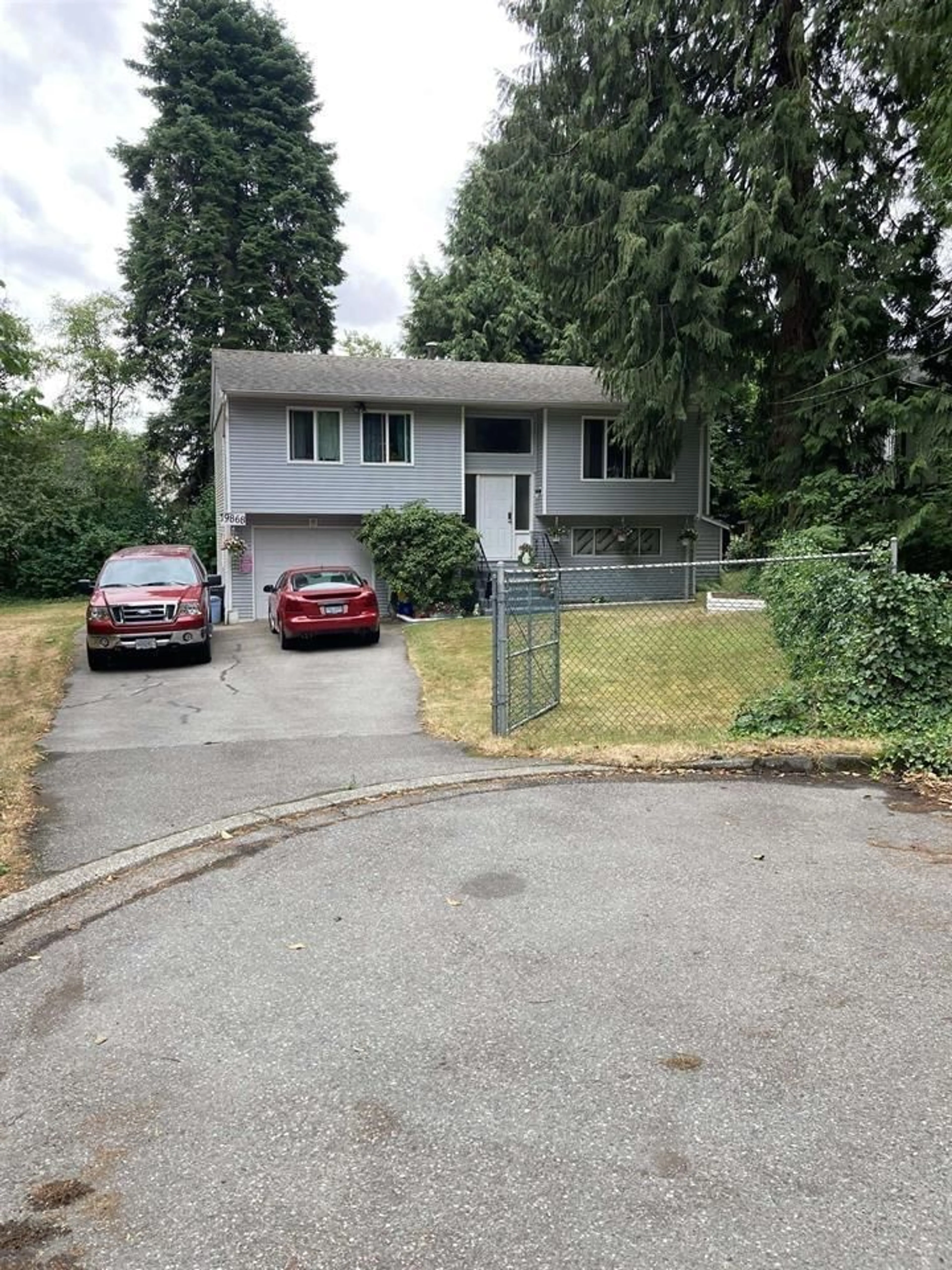 A pic from outside/outdoor area/front of a property/back of a property/a pic from drone, street for 19868 54 AVENUE, Langley British Columbia V3A3V9