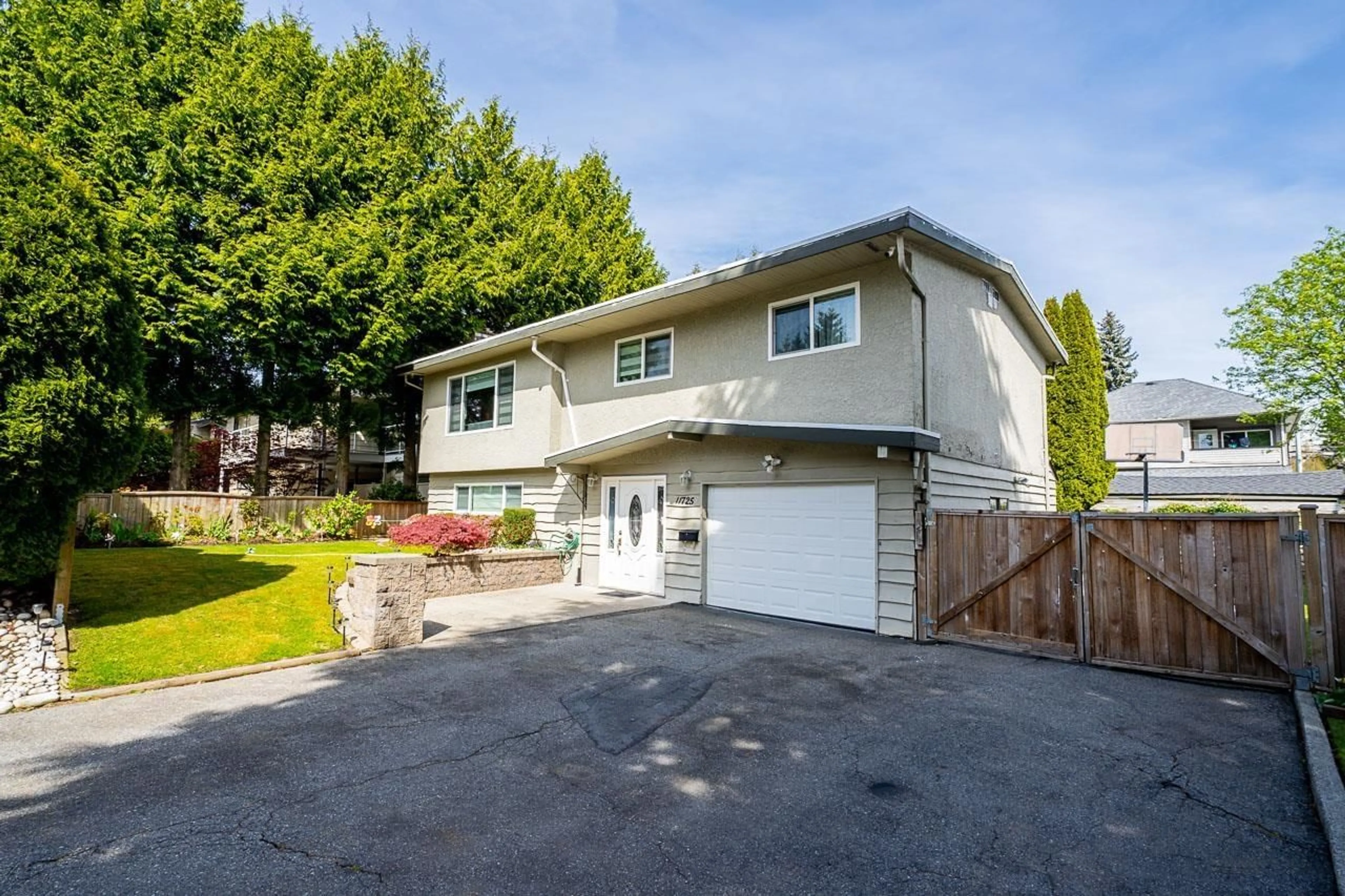 Frontside or backside of a home for 11725 83A AVENUE, Delta British Columbia V4C2J9