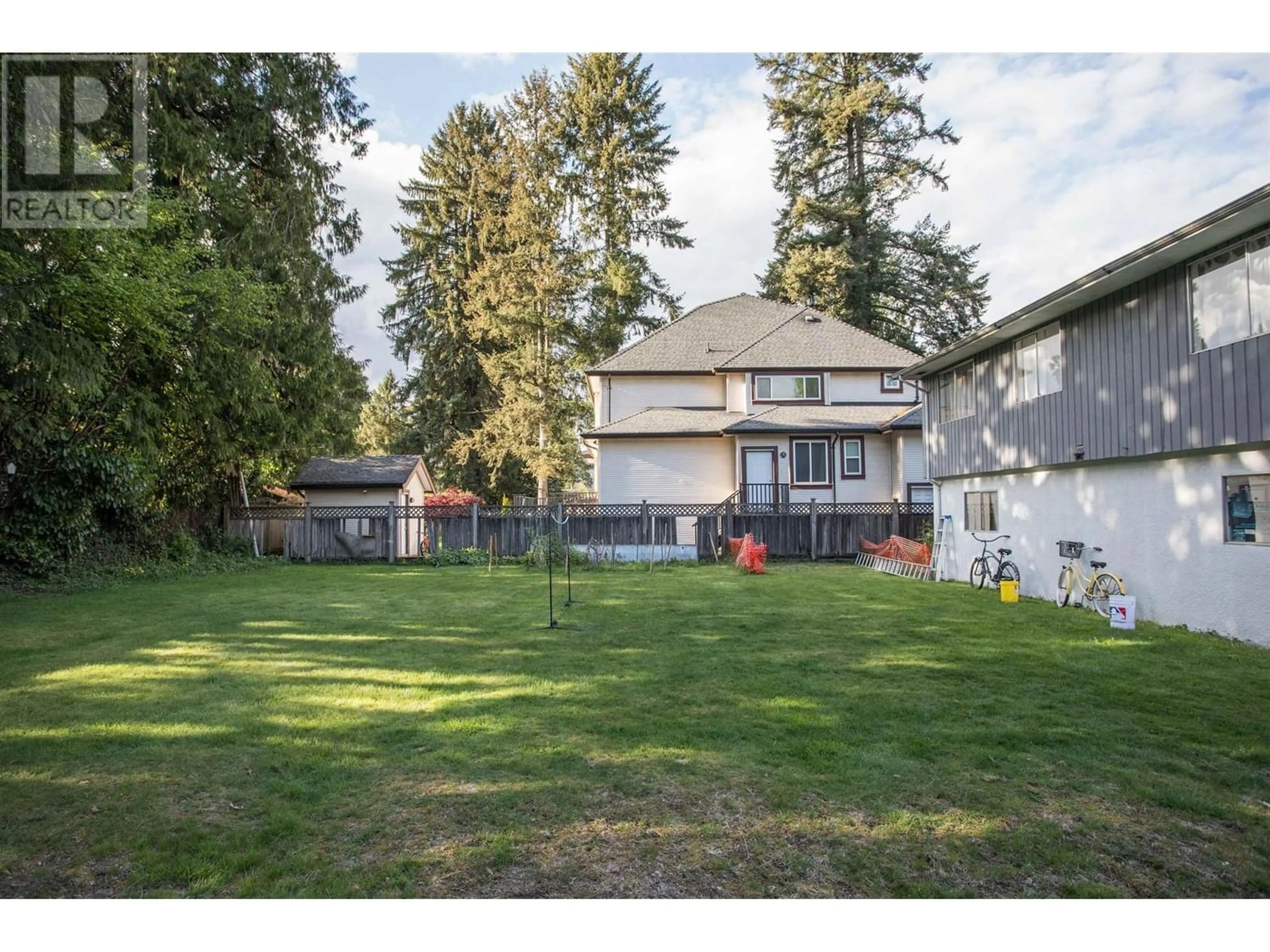 Frontside or backside of a home, the fenced backyard for 3265 FINLEY STREET, Port Coquitlam British Columbia V3B3H1