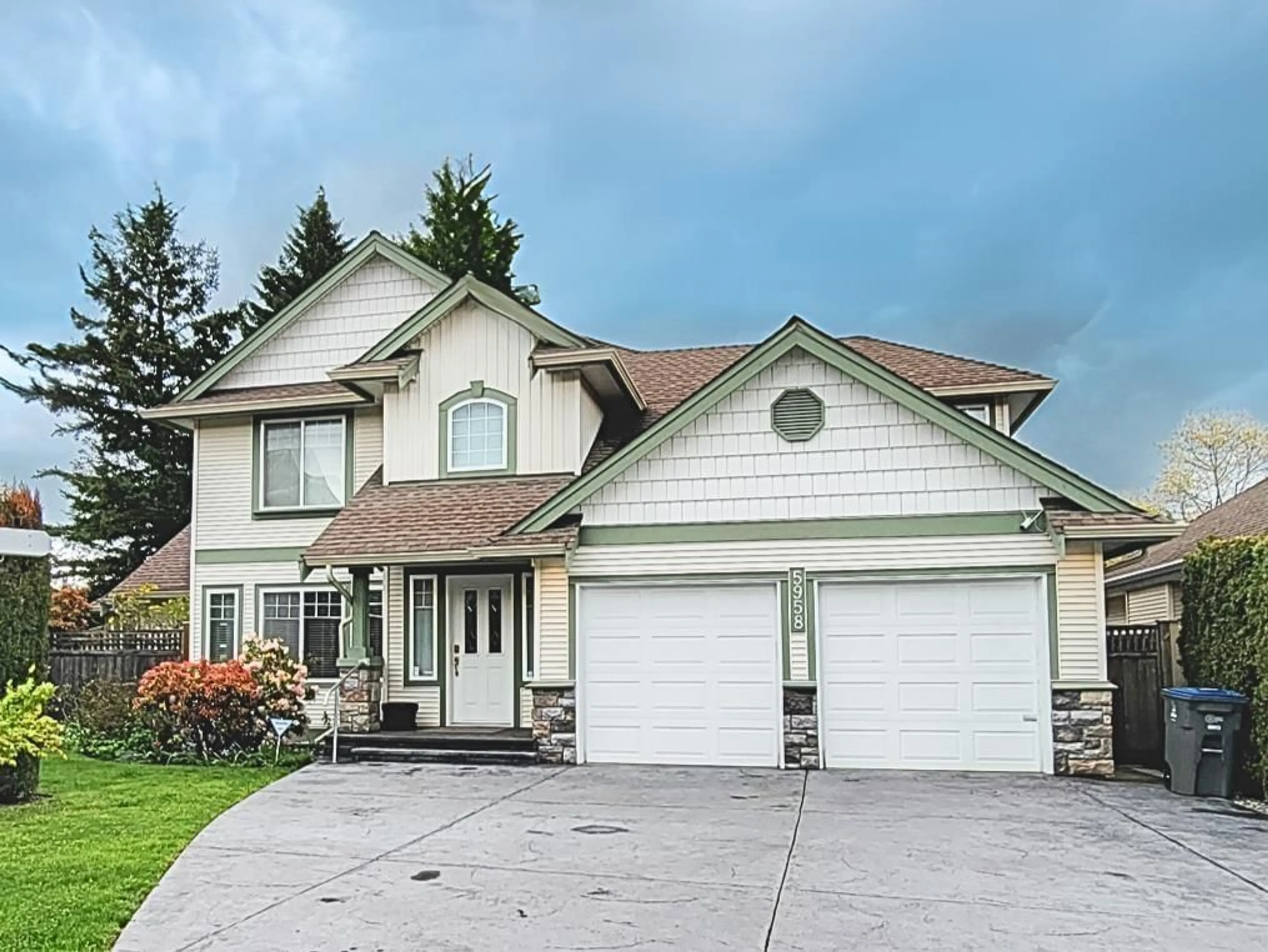 Frontside or backside of a home for 5958 168A STREET, Surrey British Columbia V3S9A3