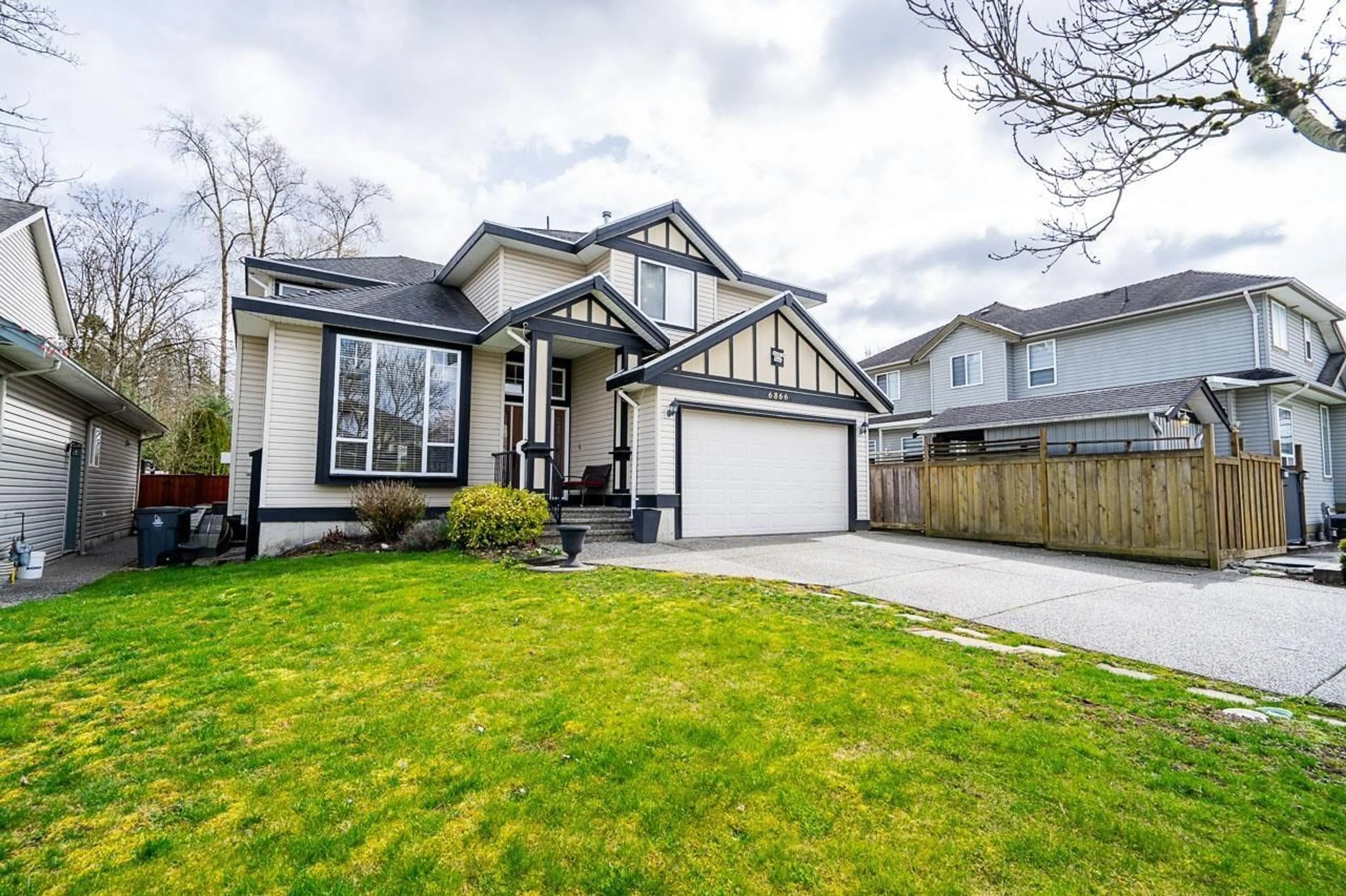 Frontside or backside of a home for 6866 184A STREET, Surrey British Columbia V3S9H9