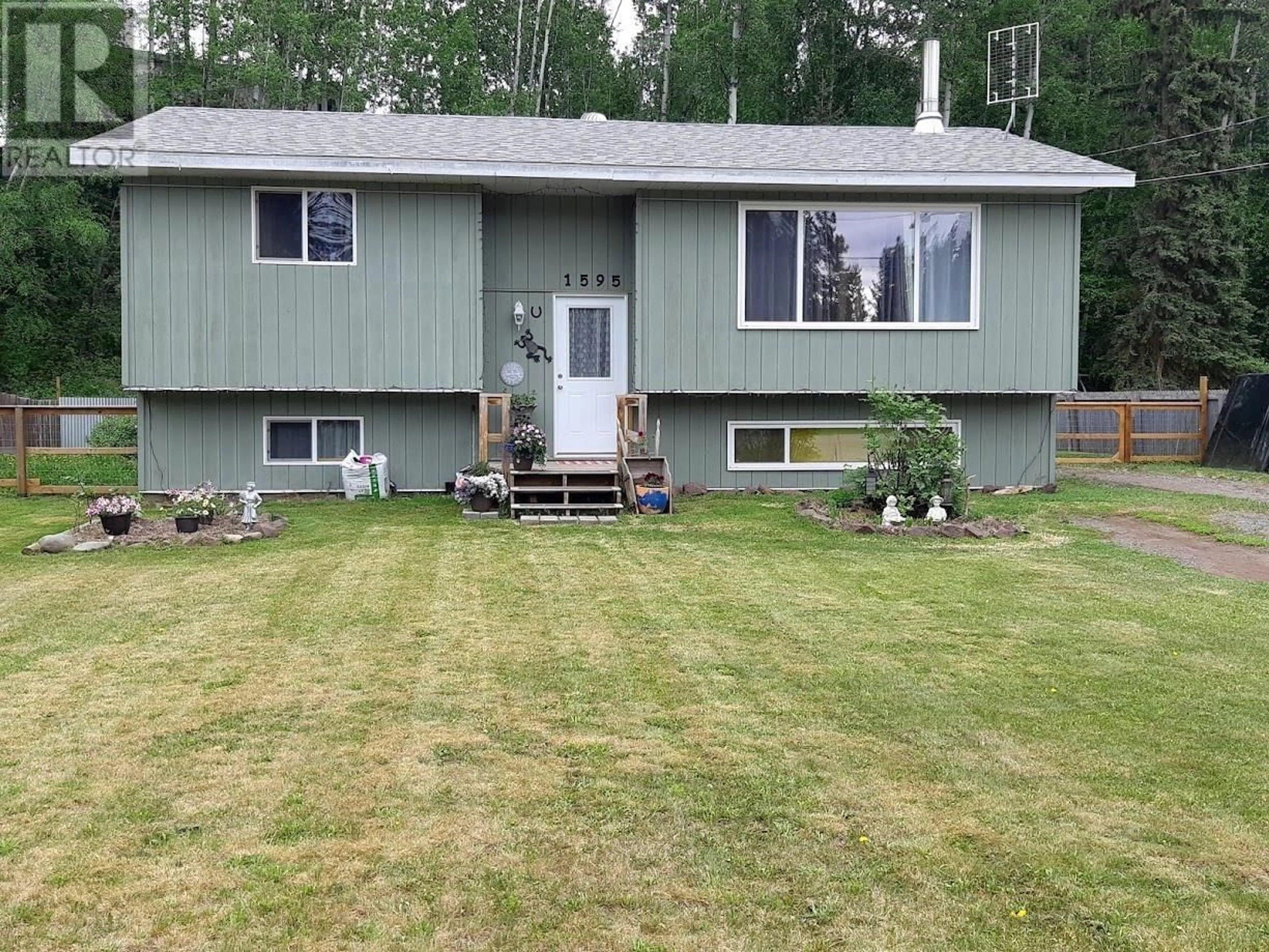 Frontside or backside of a home for 1595 WILLOW STREET, Telkwa British Columbia V0J2X0
