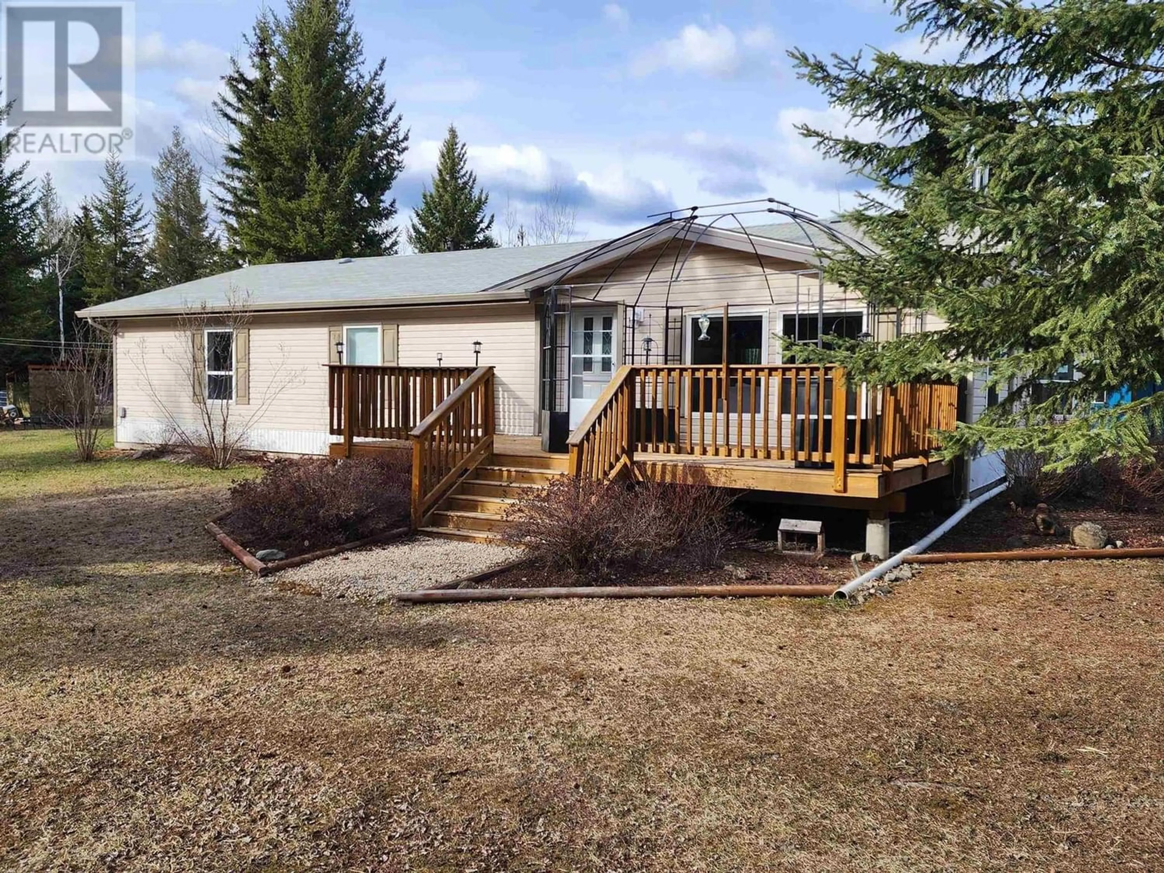 Frontside or backside of a home for 7020 COLGAN ROAD, Lone Butte British Columbia V0K1X1
