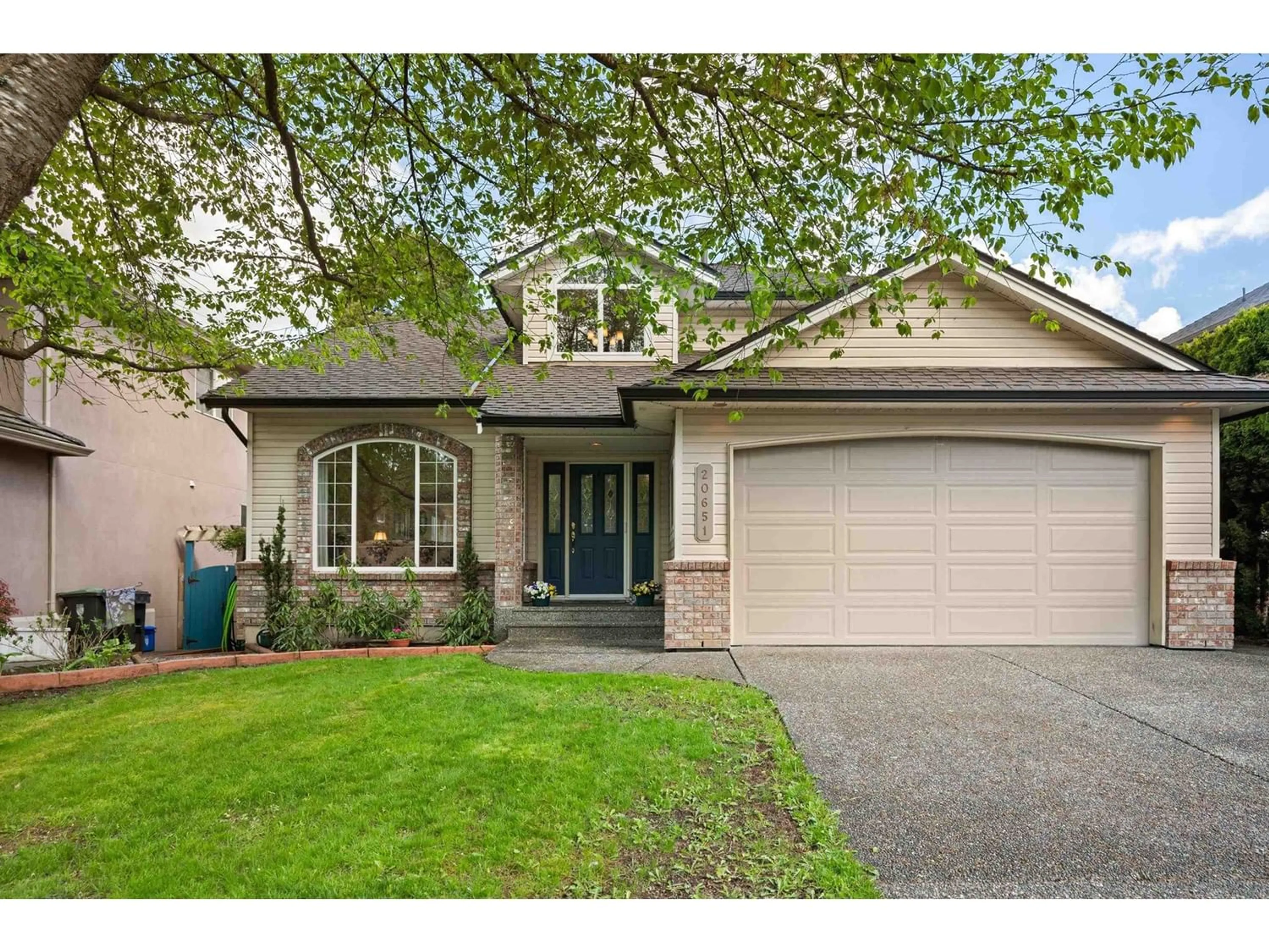 Frontside or backside of a home for 20651 91A AVENUE, Langley British Columbia V1M2K2