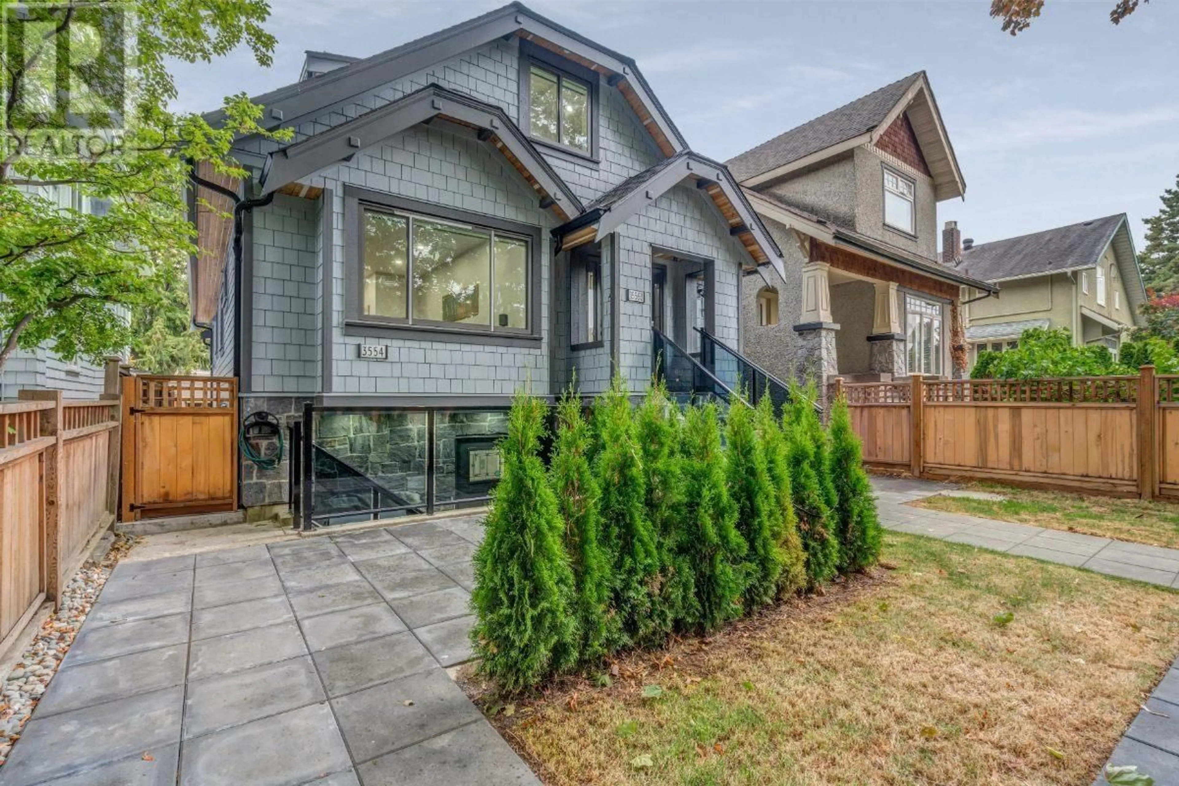 Frontside or backside of a home for 3554 W 3RD AVENUE, Vancouver British Columbia V6R1L7
