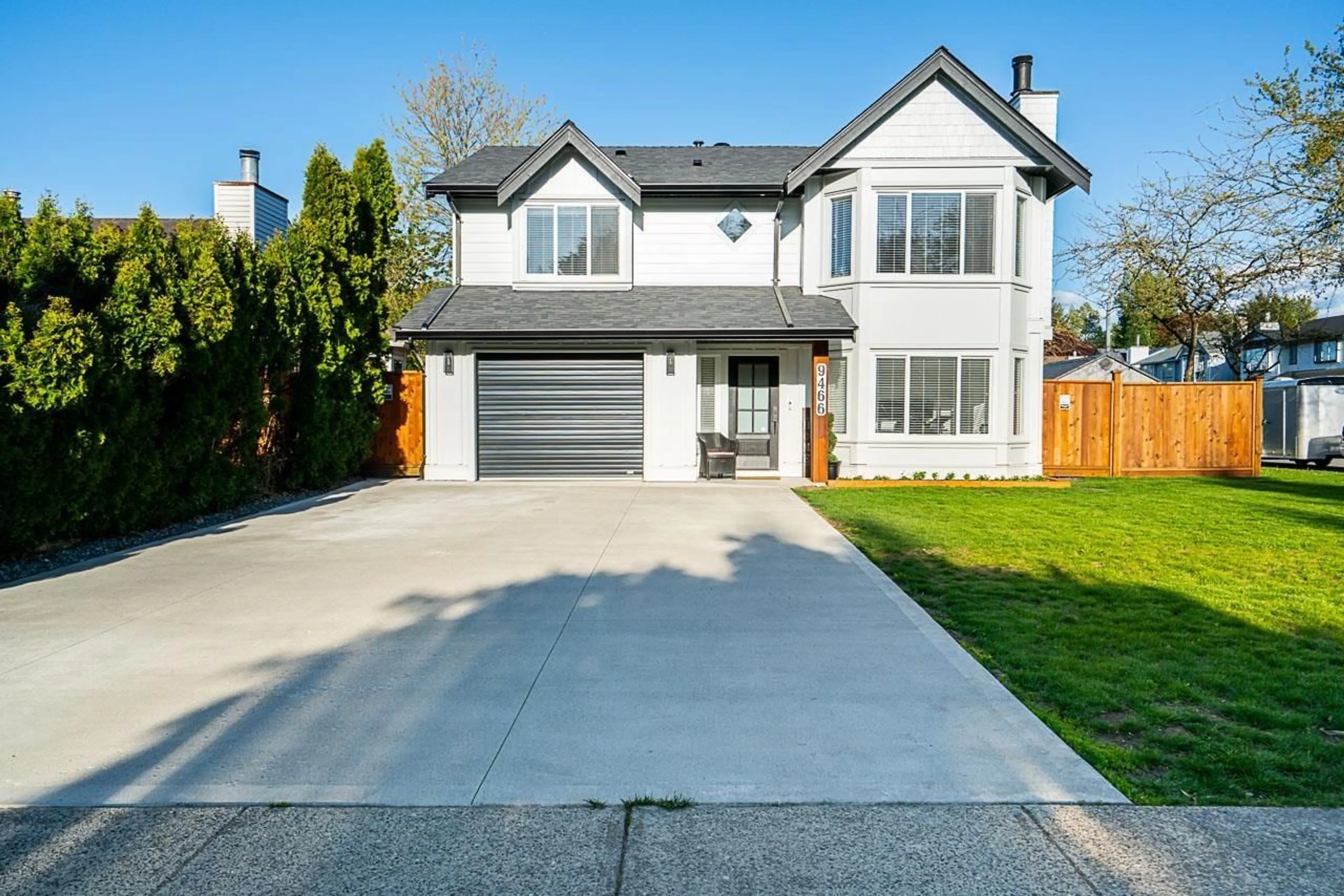 Frontside or backside of a home for 9466 209A STREET, Langley British Columbia V1M2A9