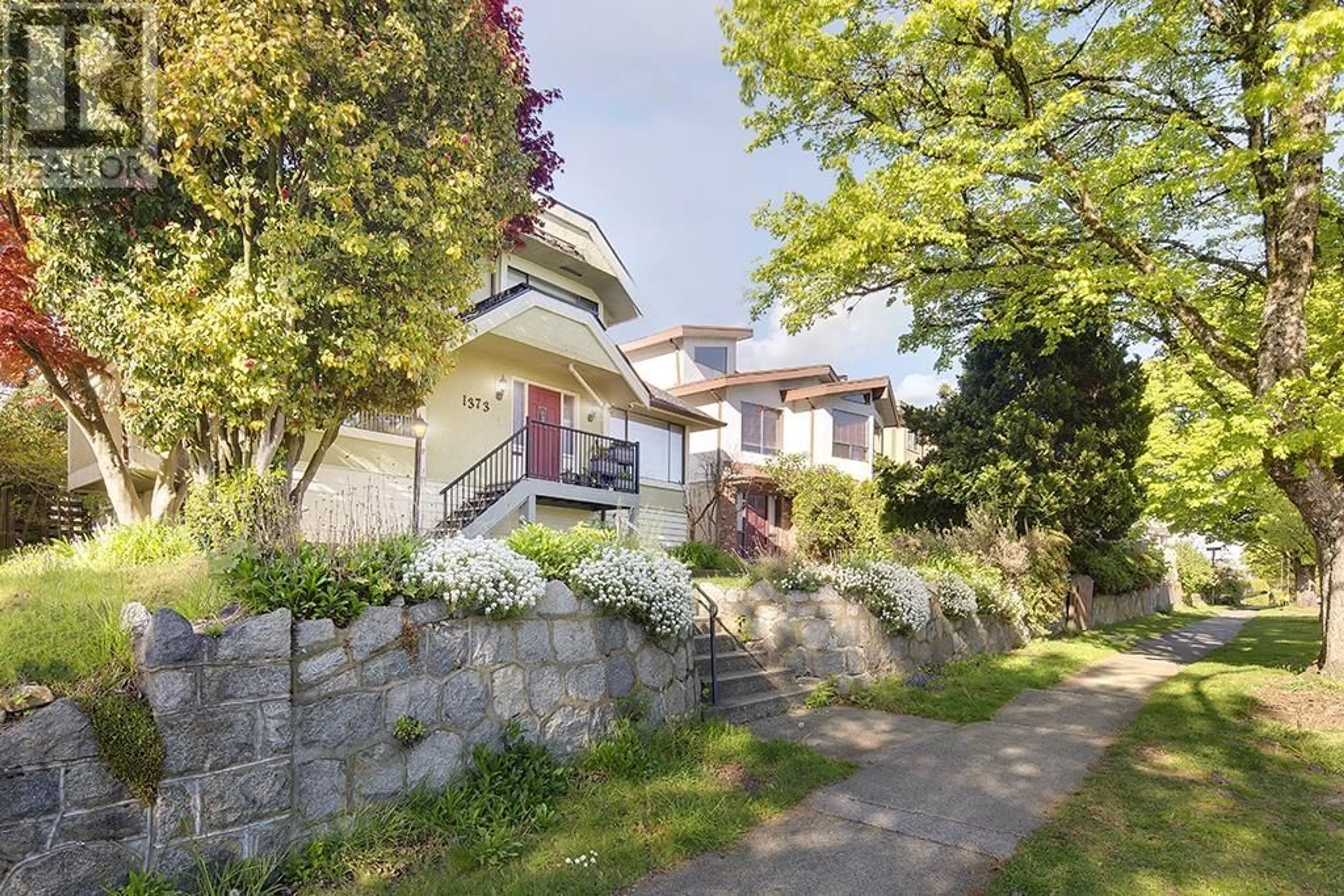 Frontside or backside of a home for 1373 W 64TH AVENUE, Vancouver British Columbia V6P2N3
