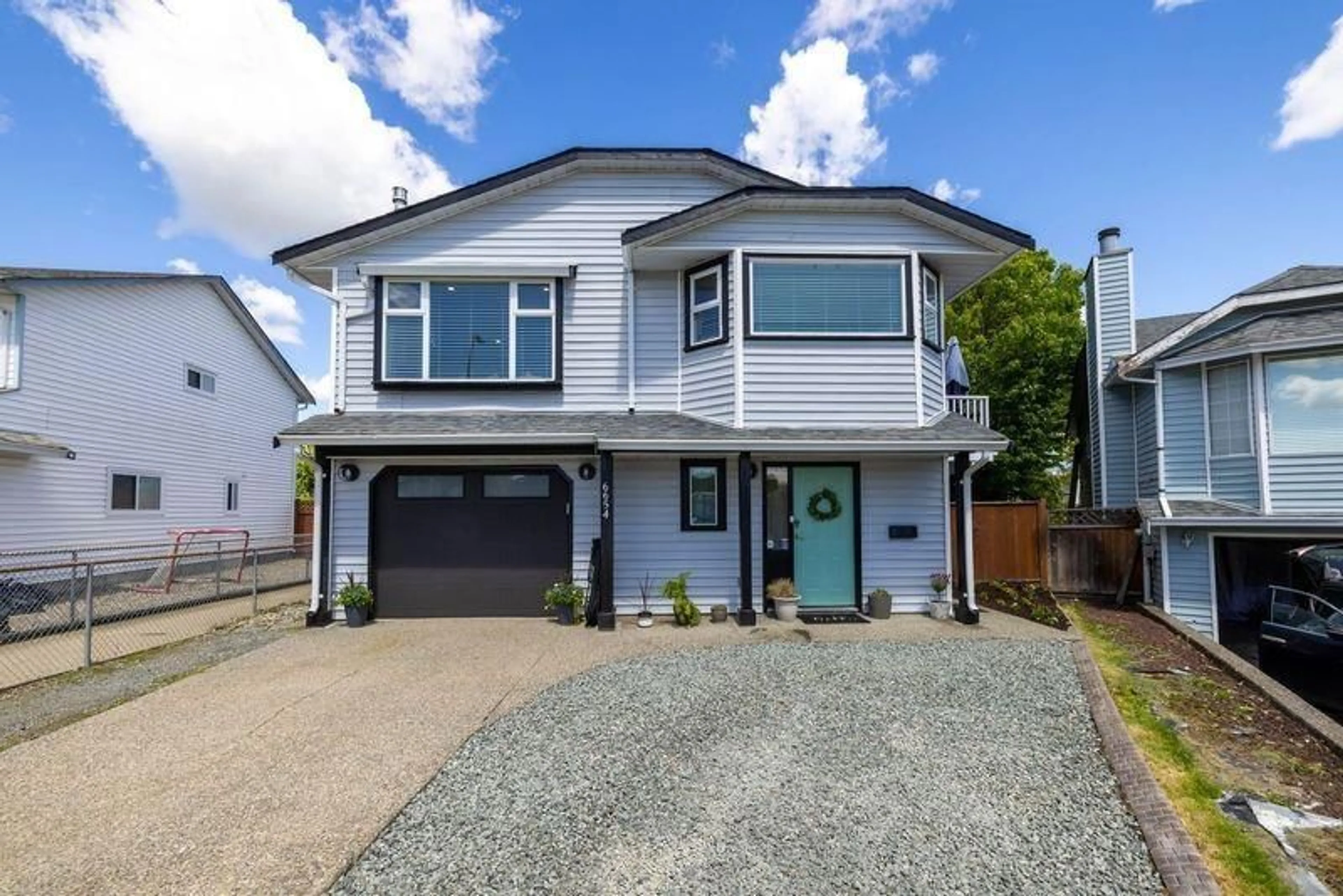 Frontside or backside of a home for 6654 WILLOUGHBY WAY, Langley British Columbia V2Y1K5