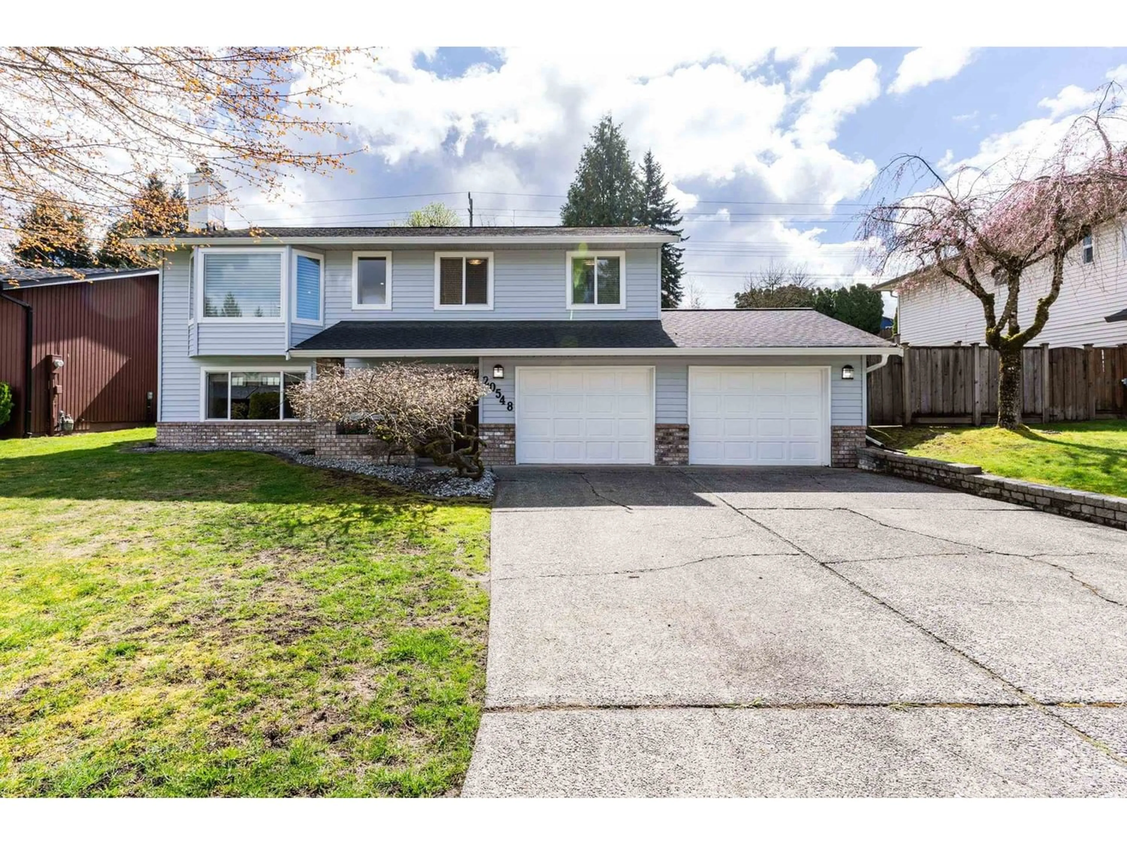 Frontside or backside of a home for 20548 95A AVENUE, Langley British Columbia V1M1H8