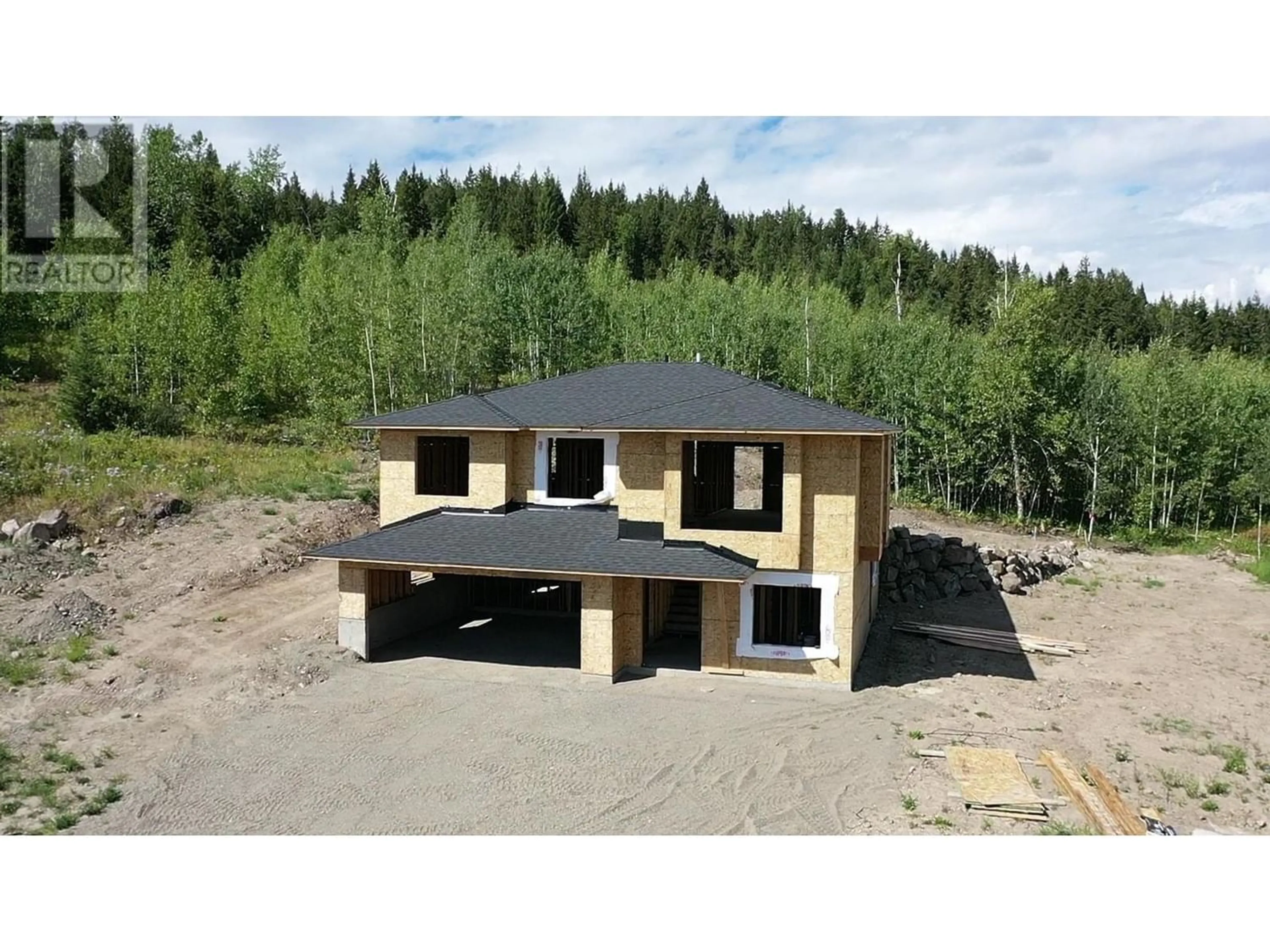 Frontside or backside of a home for LOT 7 SPRUCE PLACE, 100 Mile House British Columbia V0K2E0