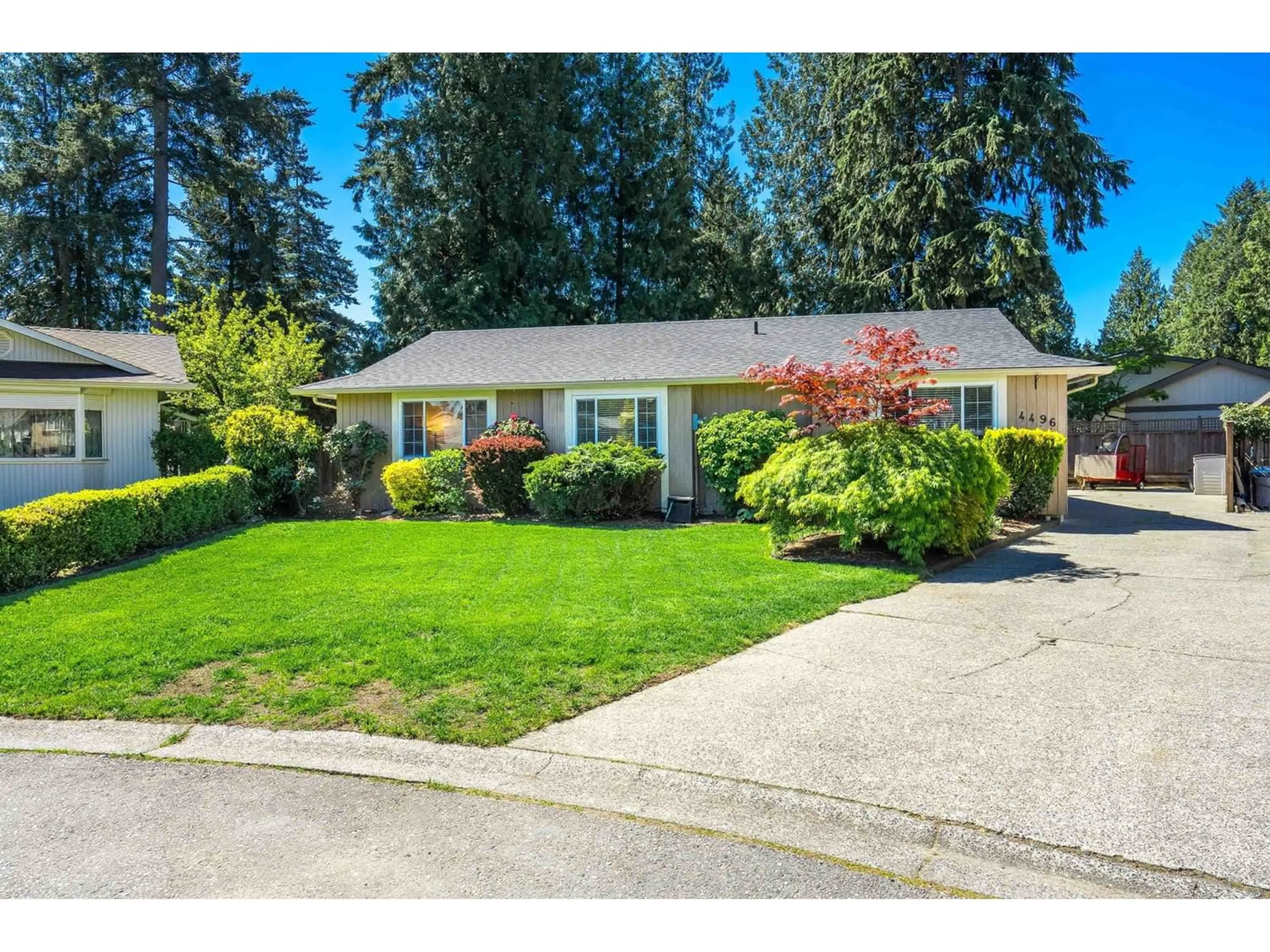 Frontside or backside of a home for 4496 203 STREET, Langley British Columbia V3A6P7