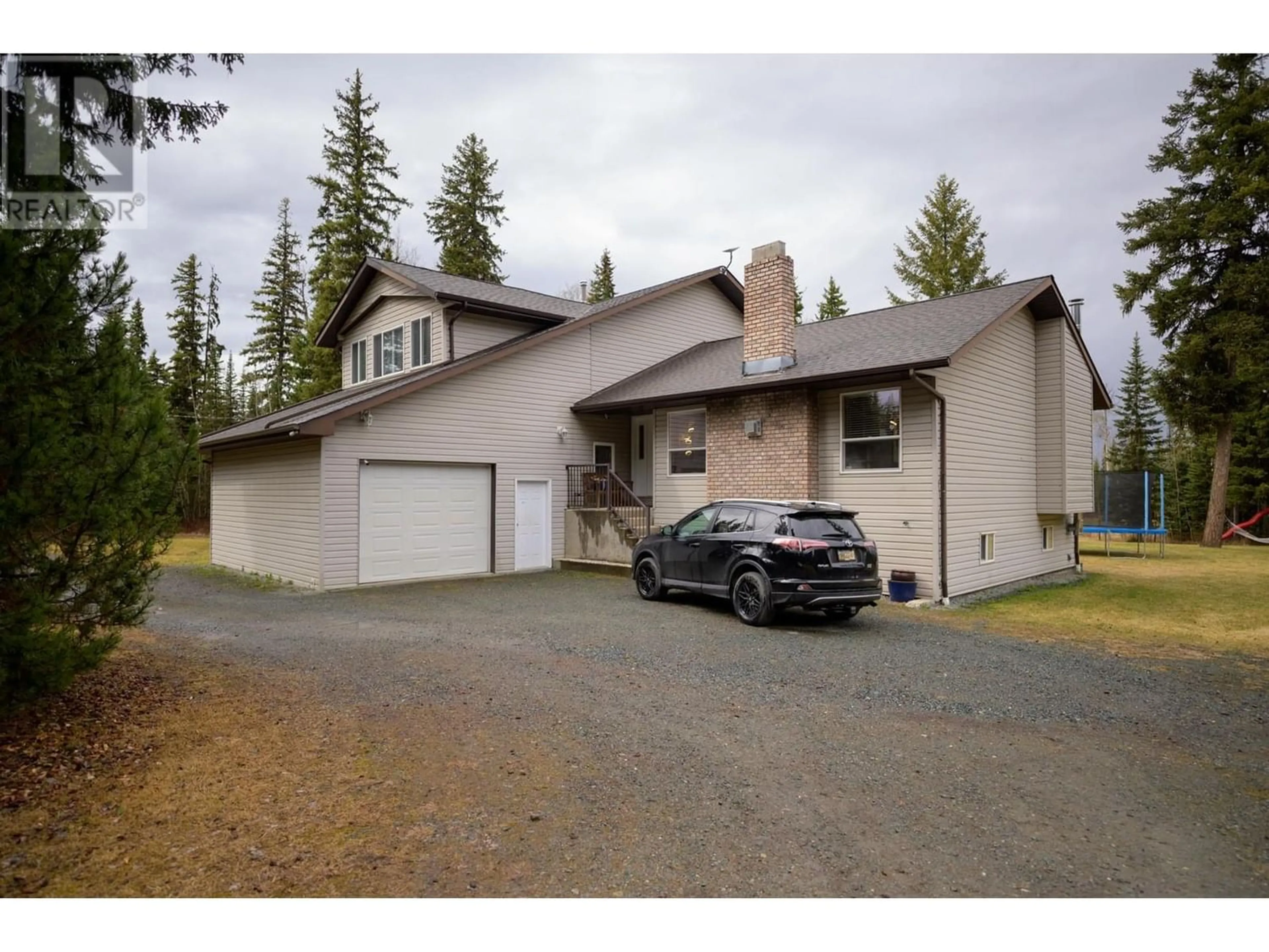 Frontside or backside of a home for 3880 SUNSHINE CRESCENT, Prince George British Columbia V2N5Y2