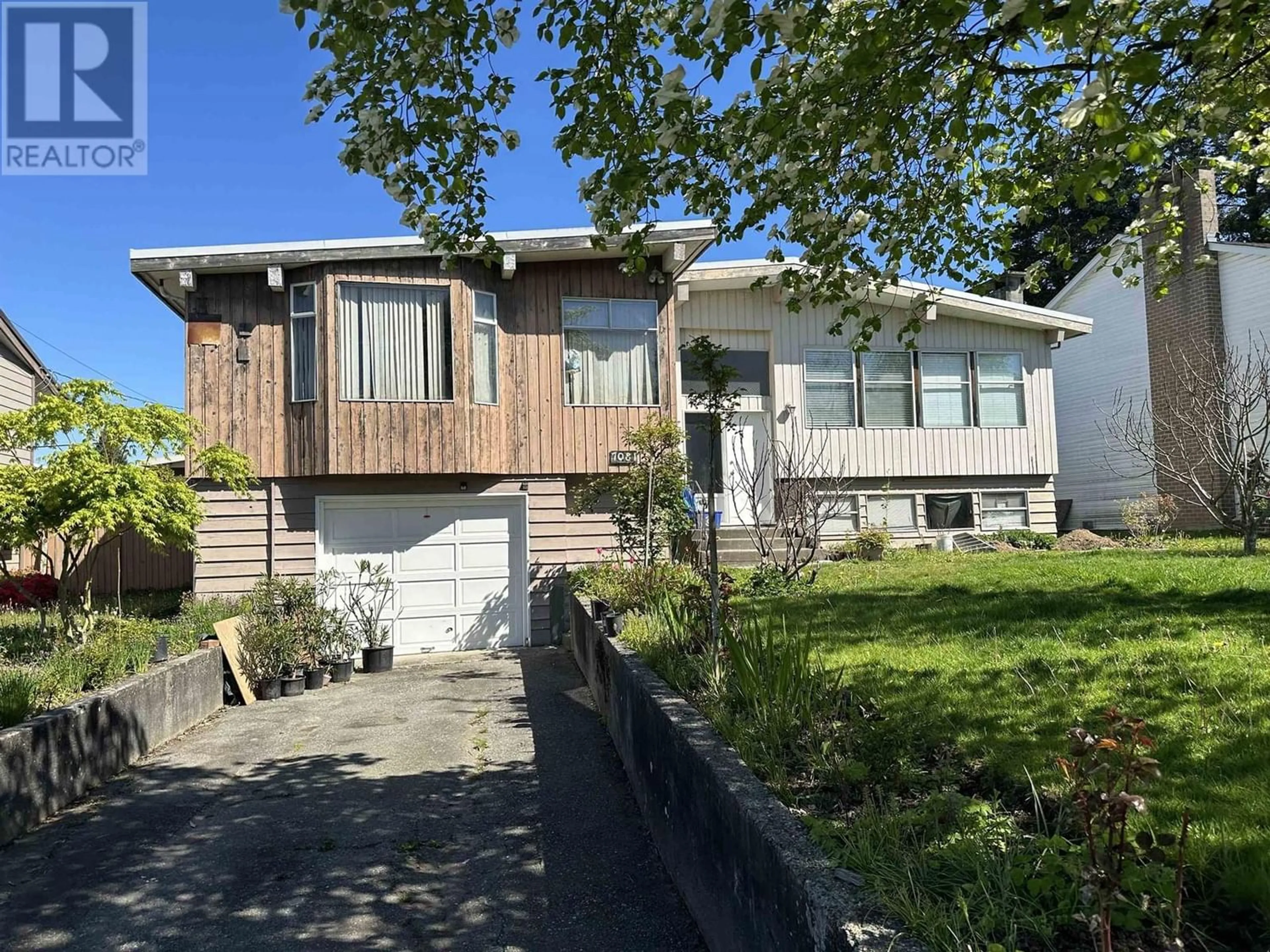 Frontside or backside of a home for 7081 ADAIR STREET, Burnaby British Columbia V5A1N5