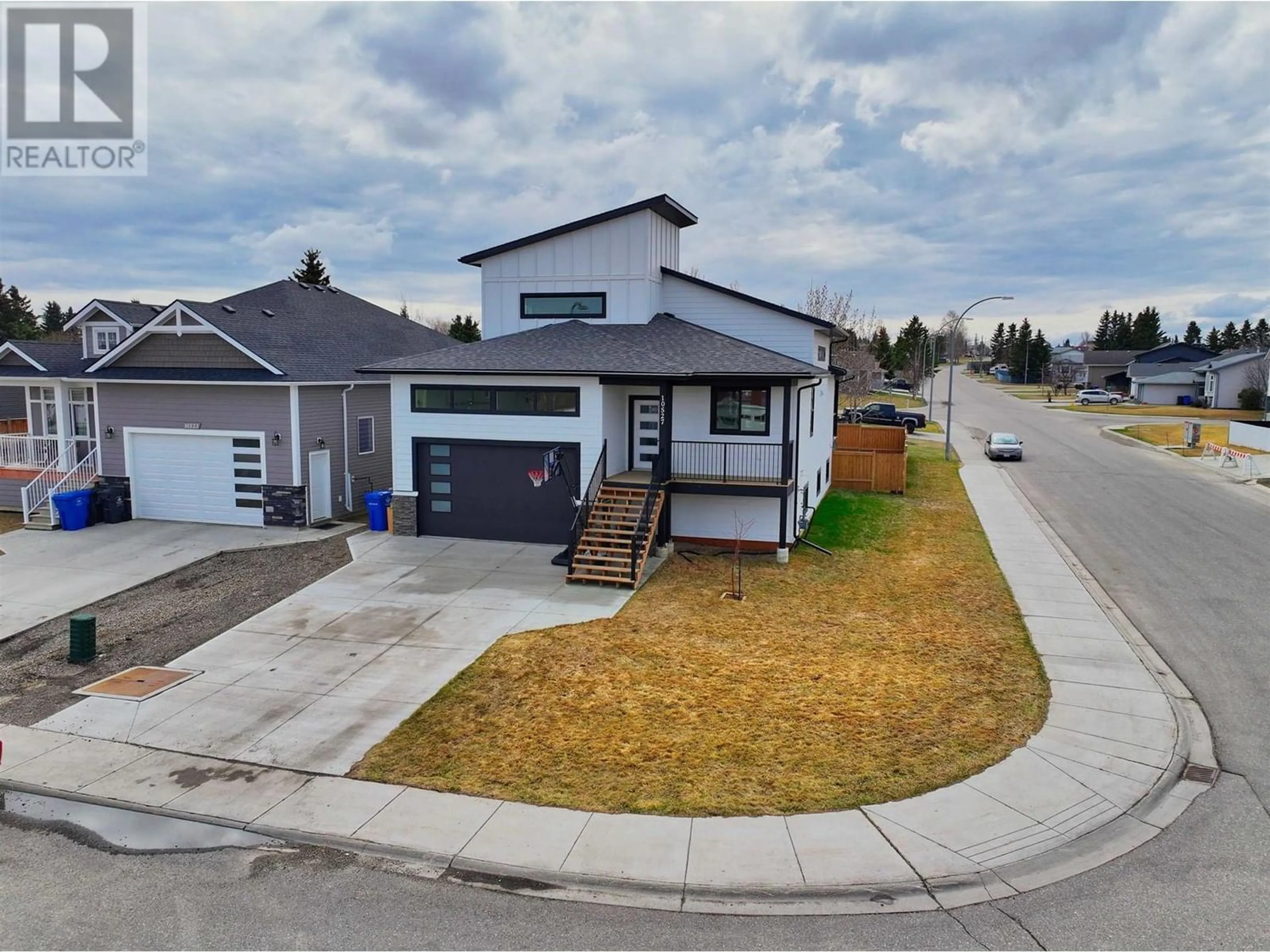 Frontside or backside of a home for 10527 114A AVENUE, Fort St. John British Columbia V1J0S1