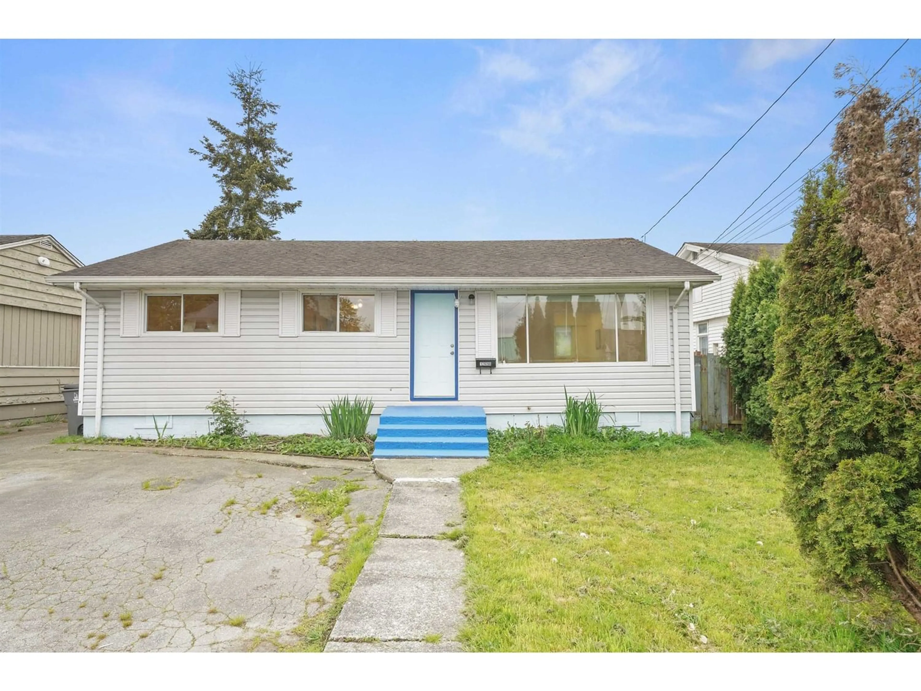 Frontside or backside of a home for 12698 113A AVENUE, Surrey British Columbia V3V3M4