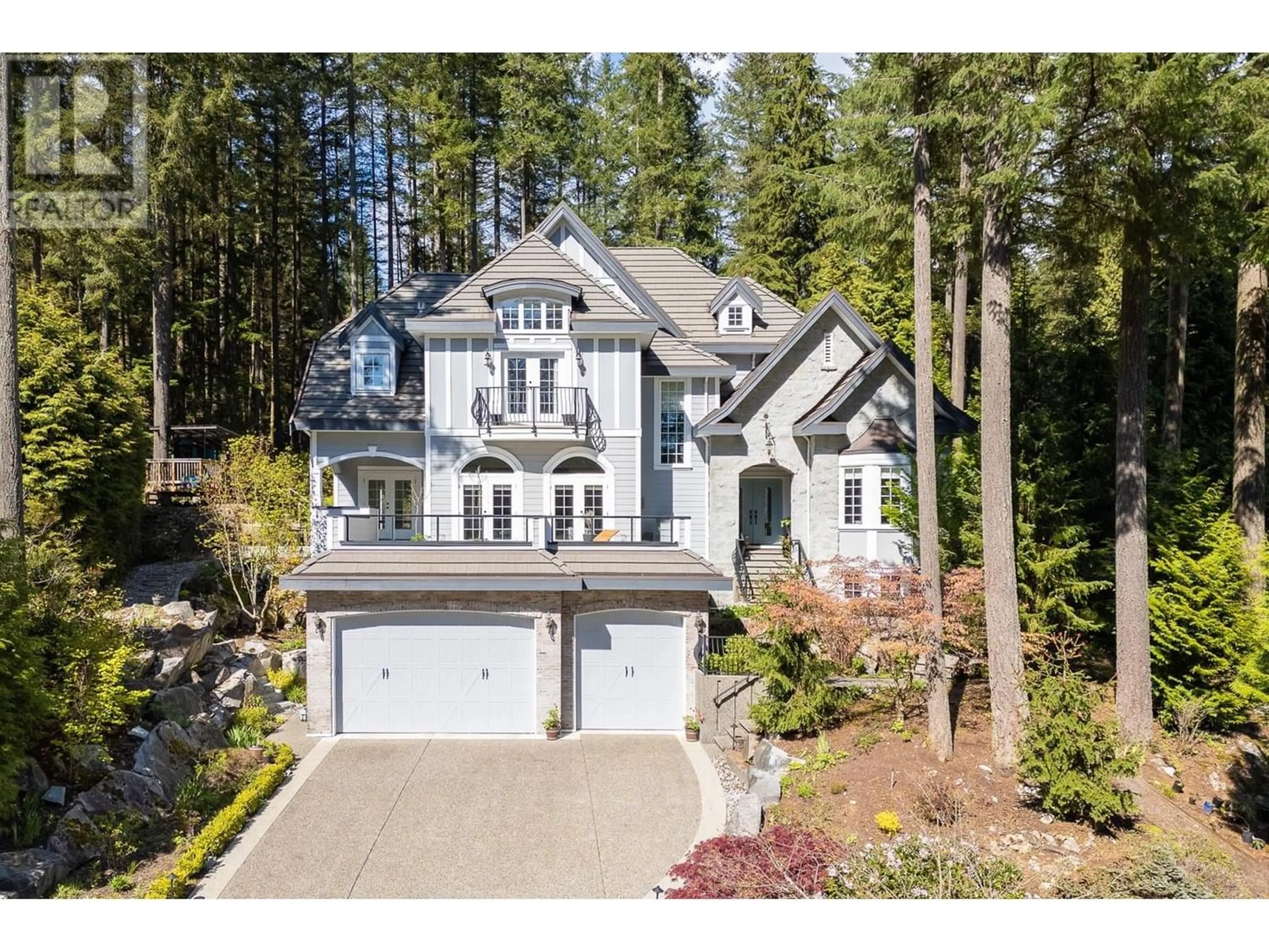 Frontside or backside of a home for 205 WESTRIDGE LANE, Anmore British Columbia V3H0A3