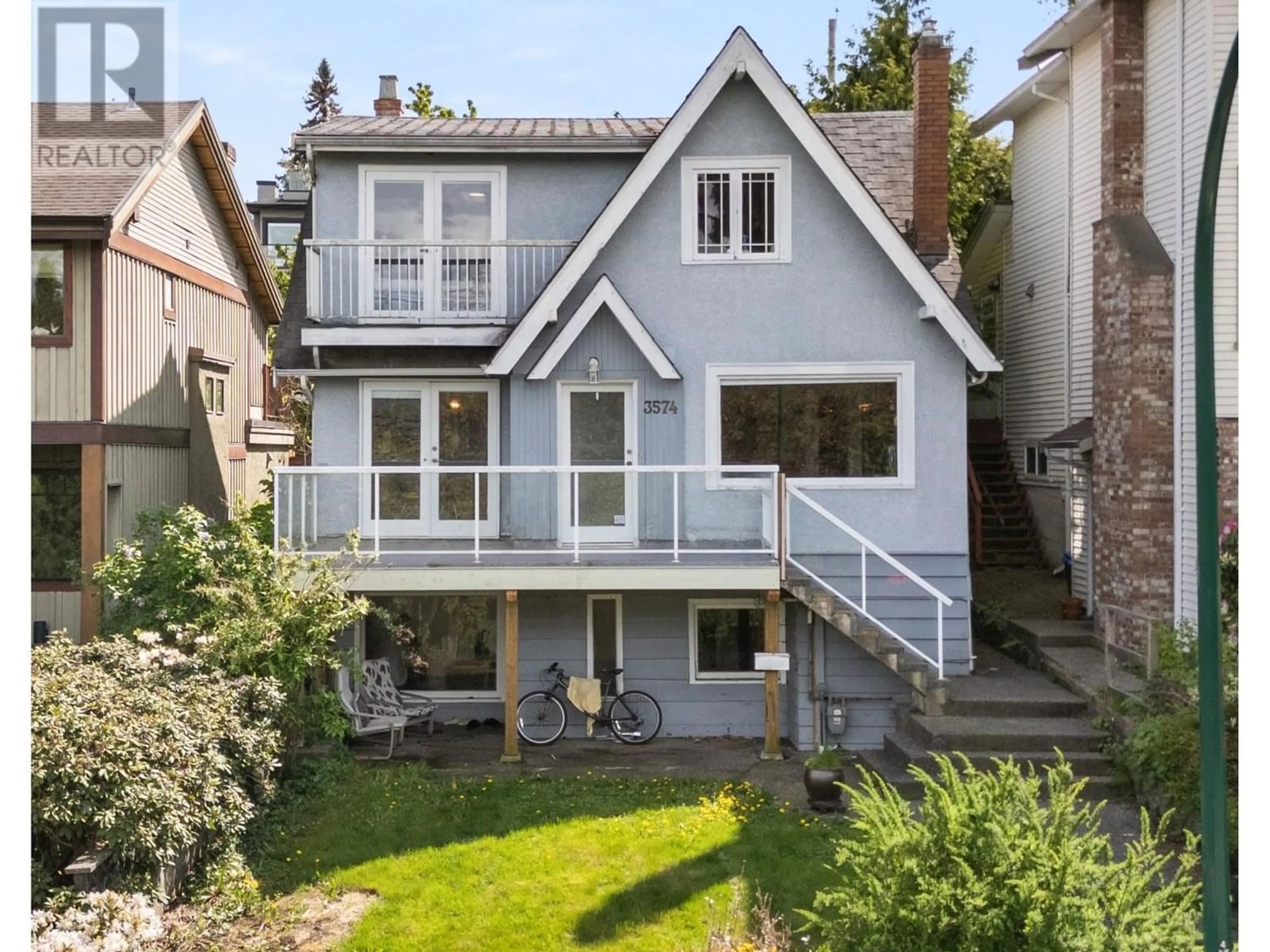 Frontside or backside of a home for 3574 W 14TH AVENUE, Vancouver British Columbia V6R2W4