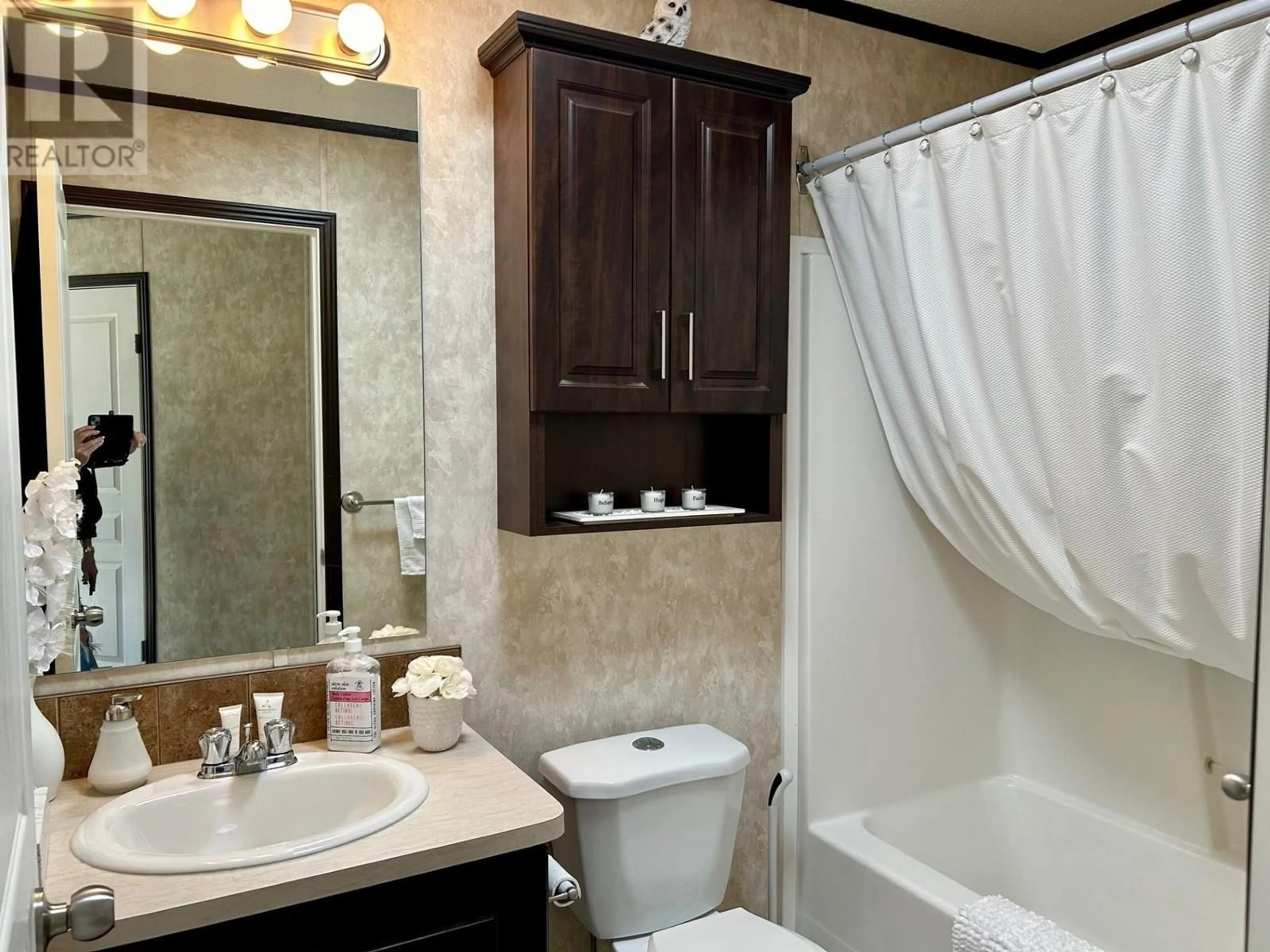 Standard bathroom, ceramic/tile floor for 5227 42 STREET, Fort Nelson British Columbia V0C1R0