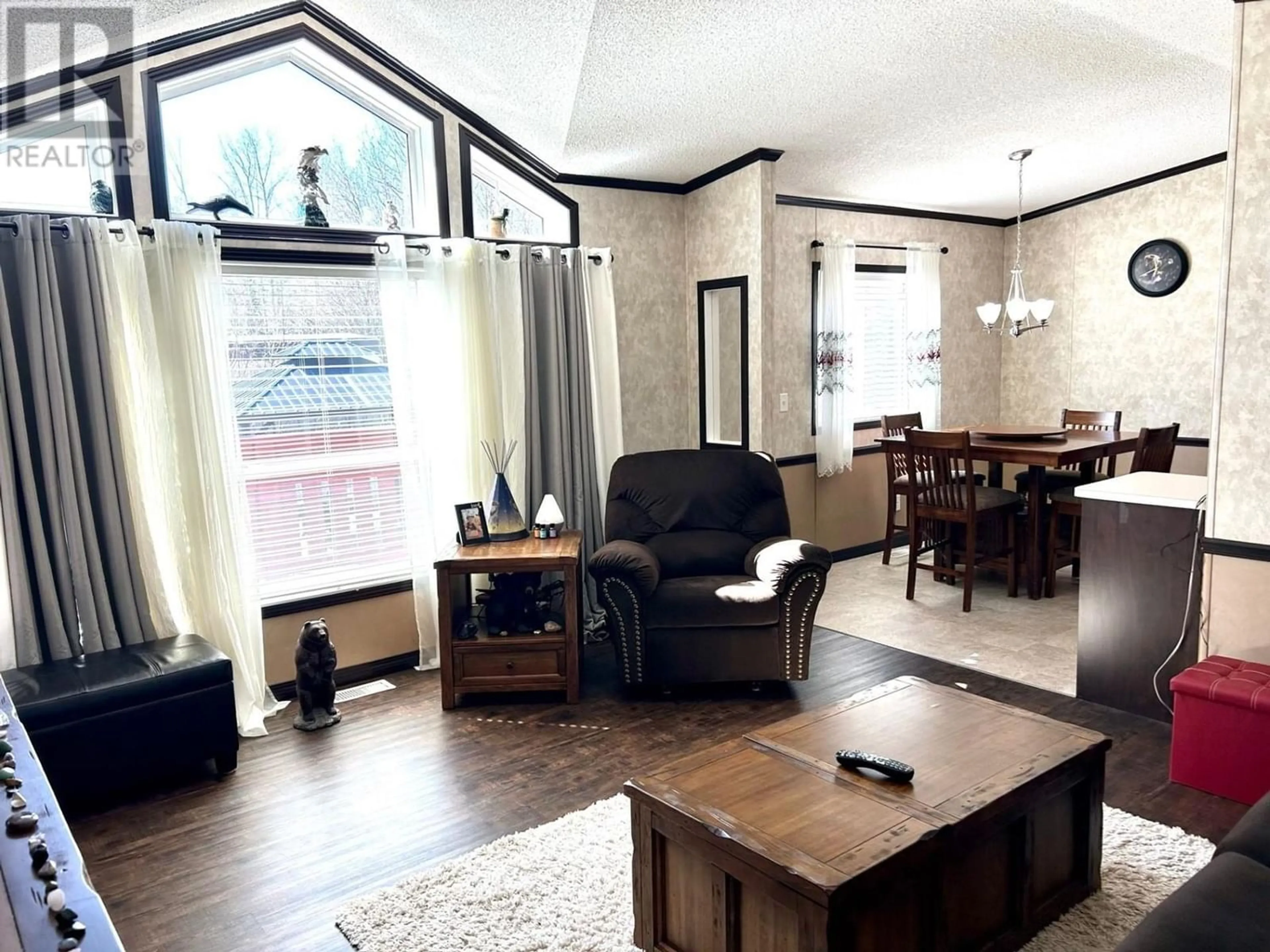 Living room, wood floors for 5227 42 STREET, Fort Nelson British Columbia V0C1R0