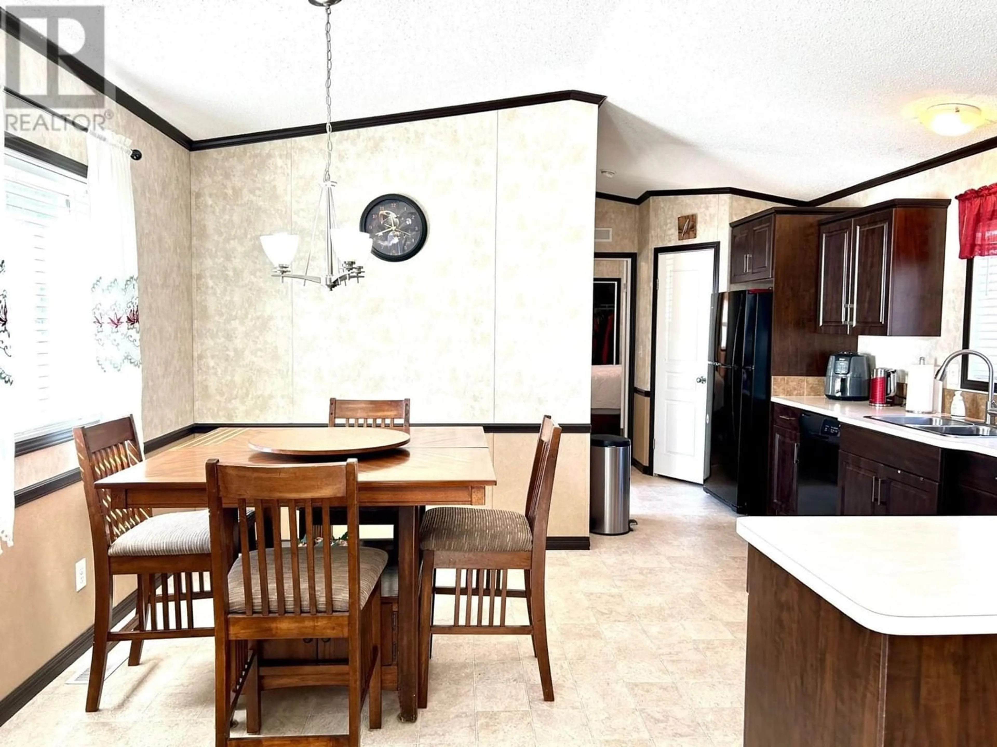 Open concept kitchen for 5227 42 STREET, Fort Nelson British Columbia V0C1R0