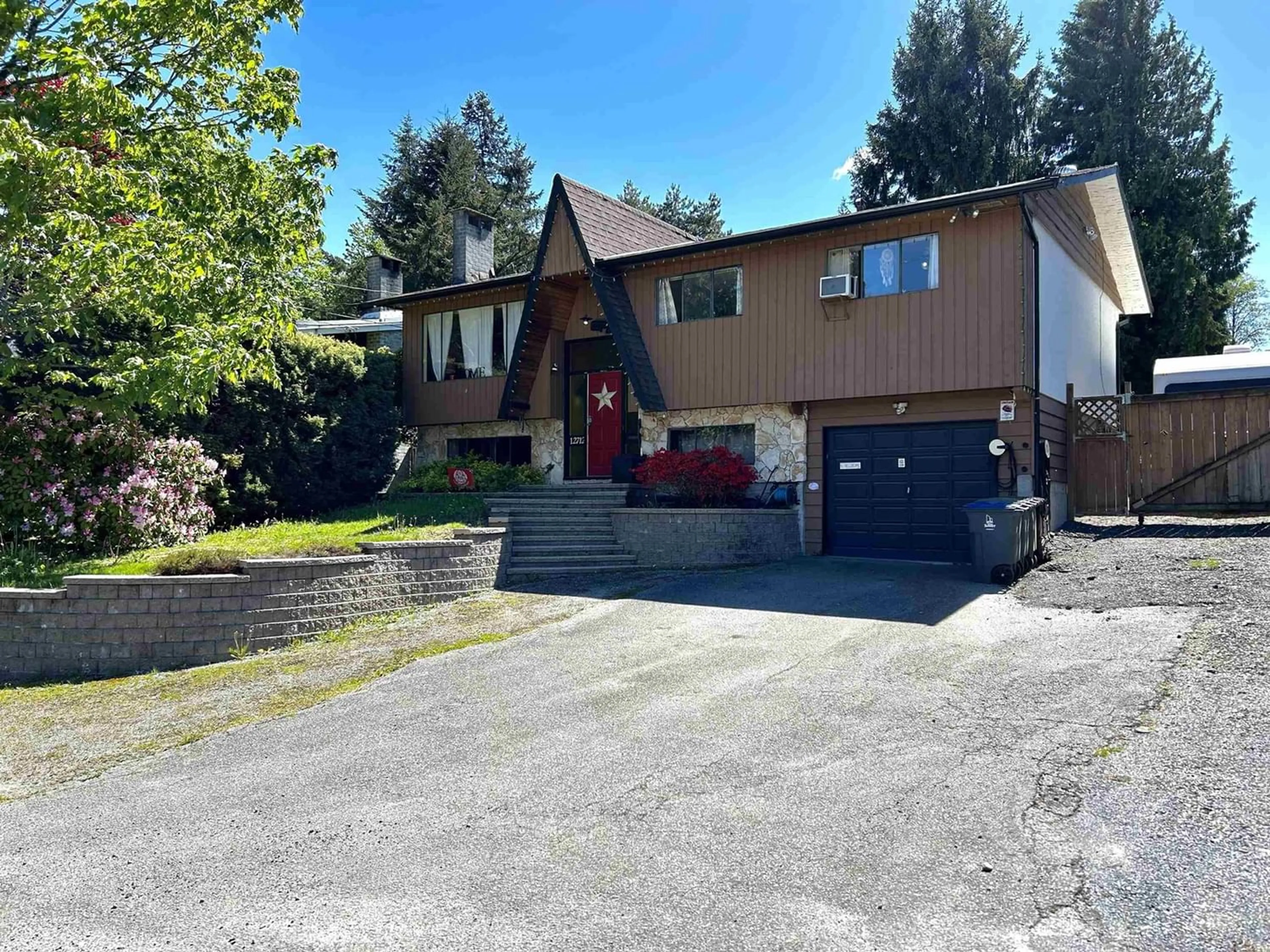 Frontside or backside of a home for 12712 98 AVENUE, Surrey British Columbia V3V6B1