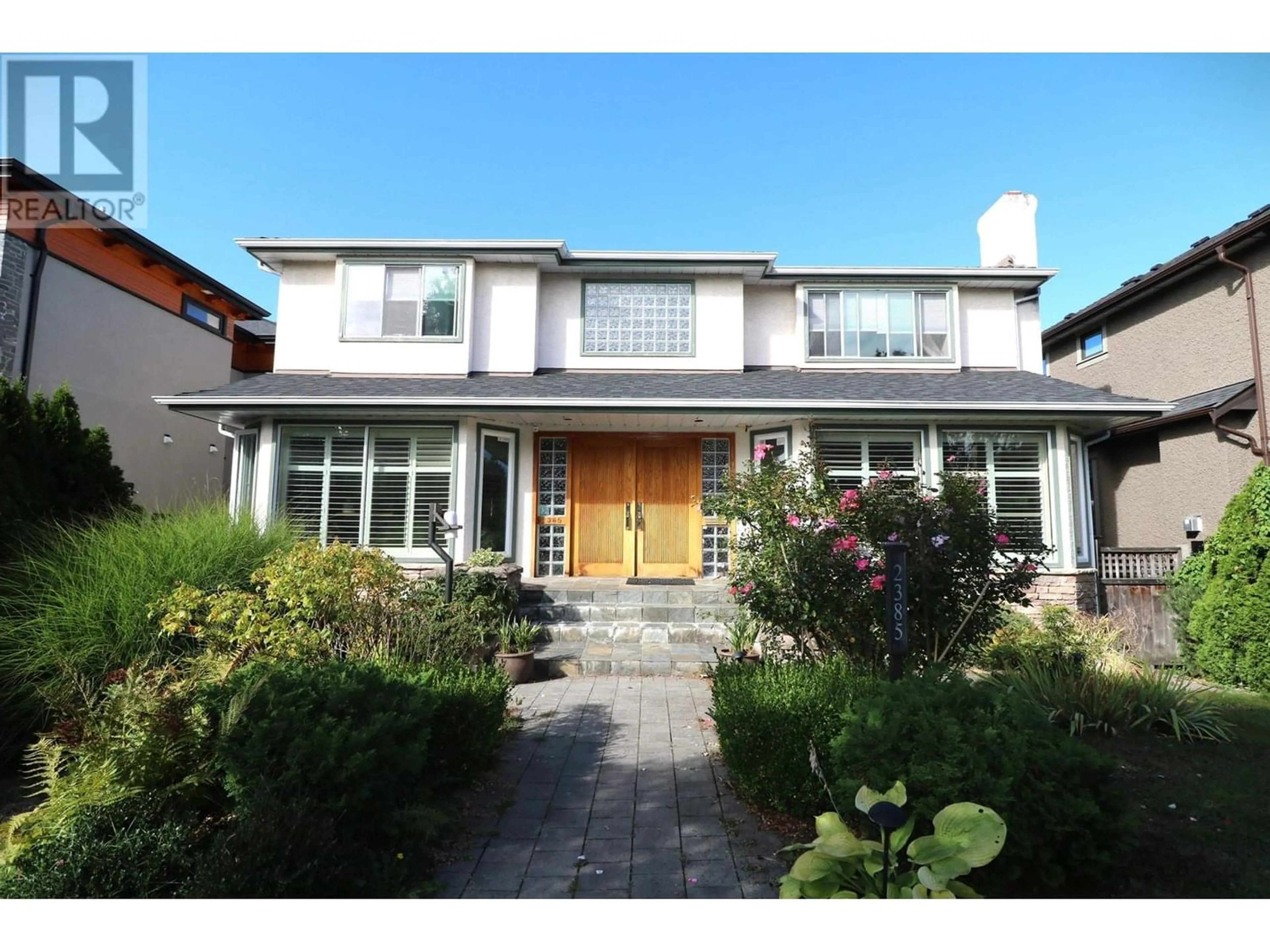 Frontside or backside of a home for 2385 W 22ND AVENUE, Vancouver British Columbia V6L1L8