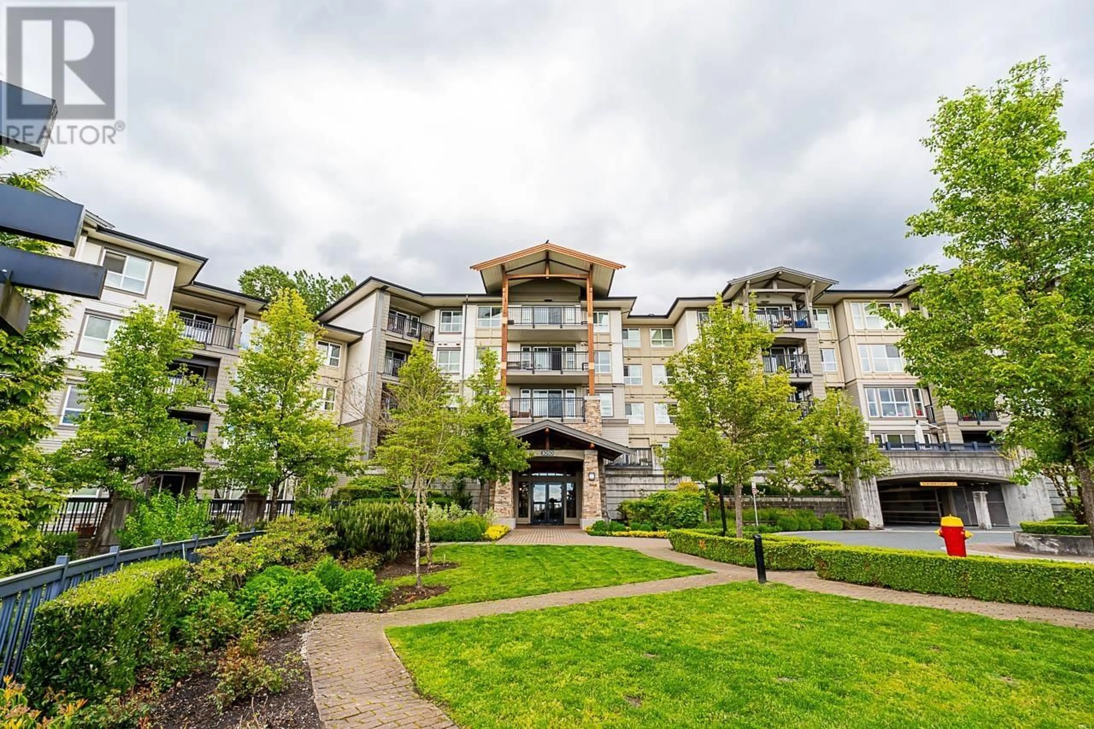 A pic from exterior of the house or condo for 417 3050 DAYANEE SPRINGS BOULEVARD, Coquitlam British Columbia V3E0A2