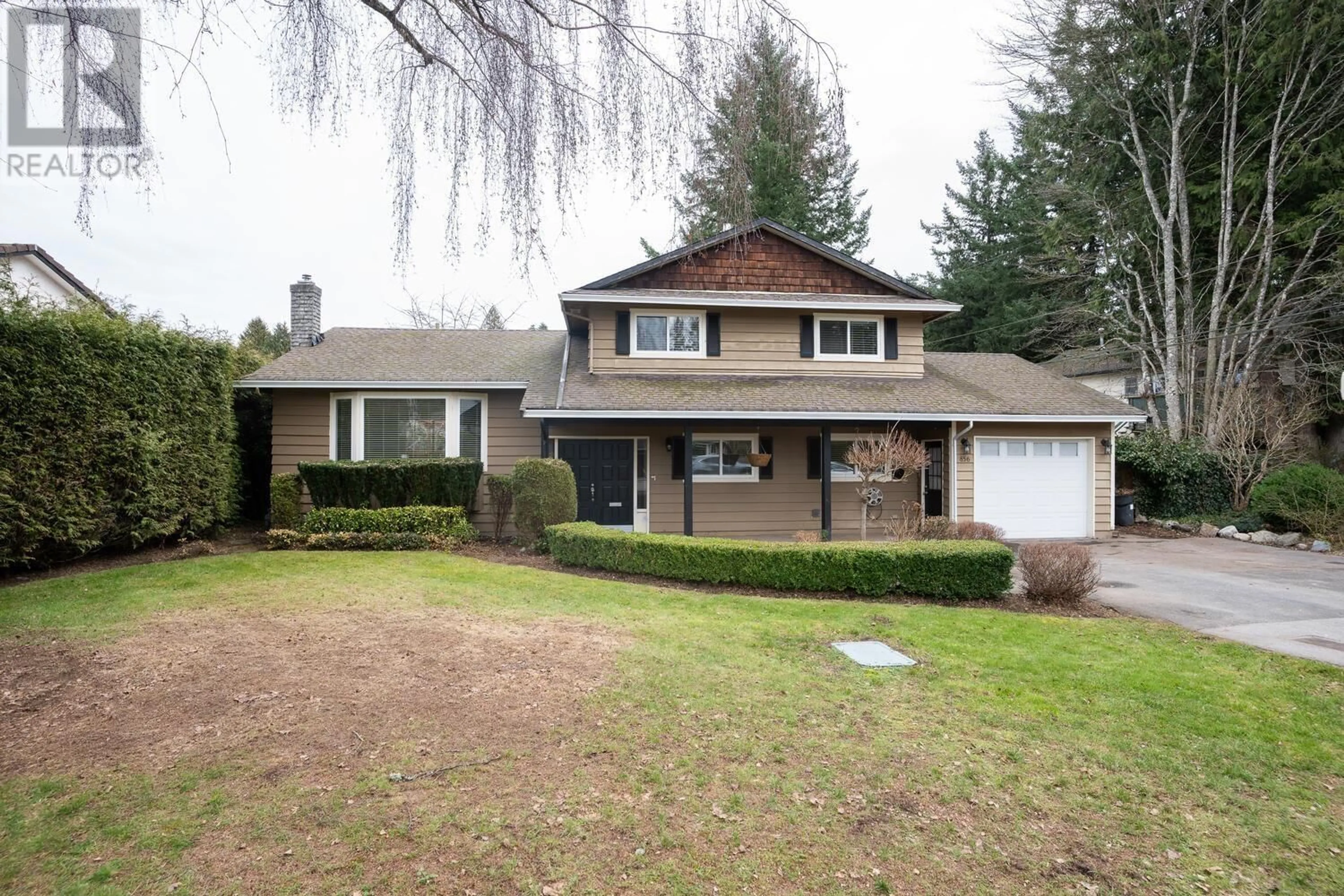Frontside or backside of a home for 856 55A STREET, Delta British Columbia V4M3M4