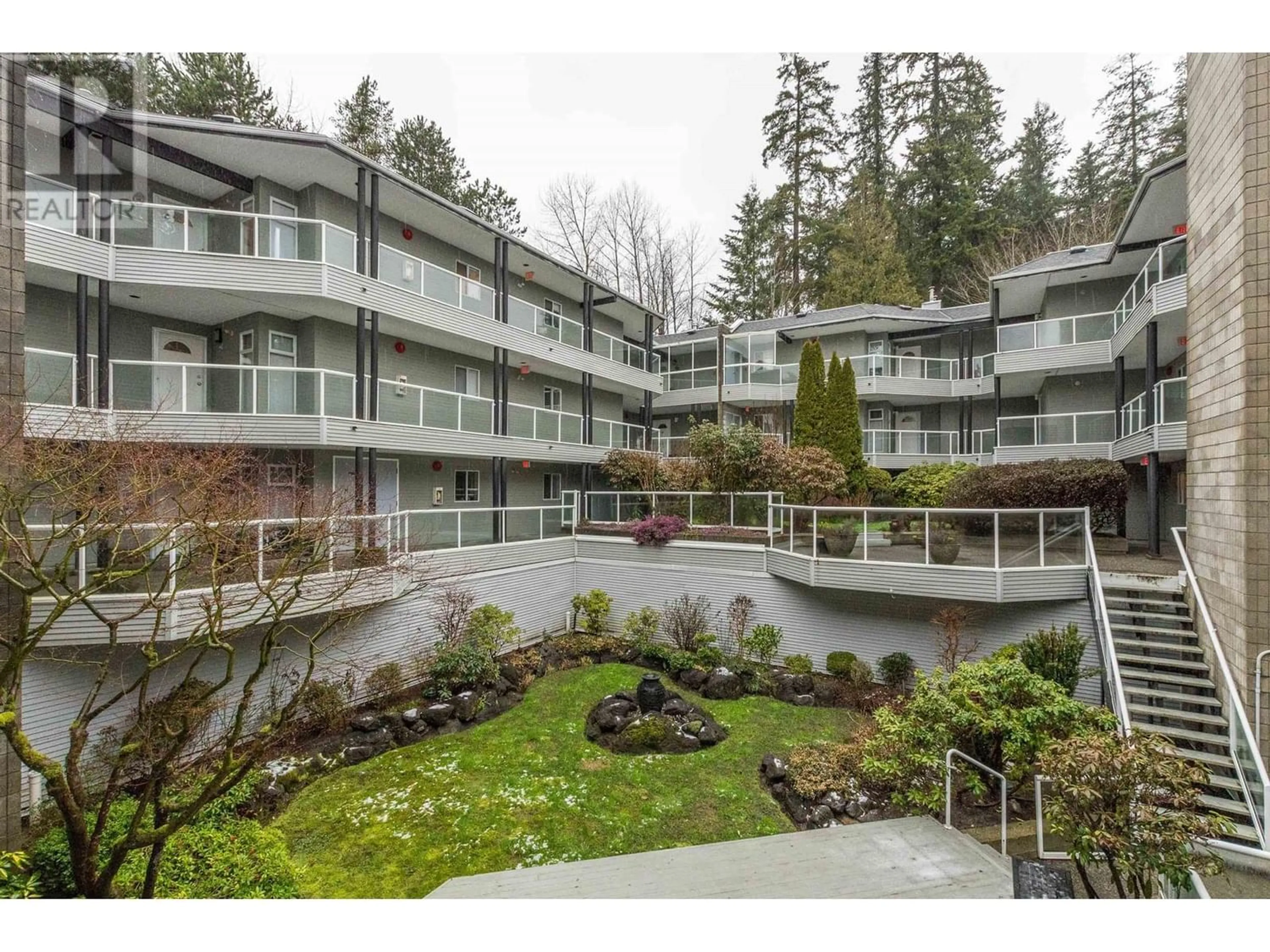 A pic from exterior of the house or condo for 202 2733 ATLIN PLACE, Coquitlam British Columbia V3C5B1