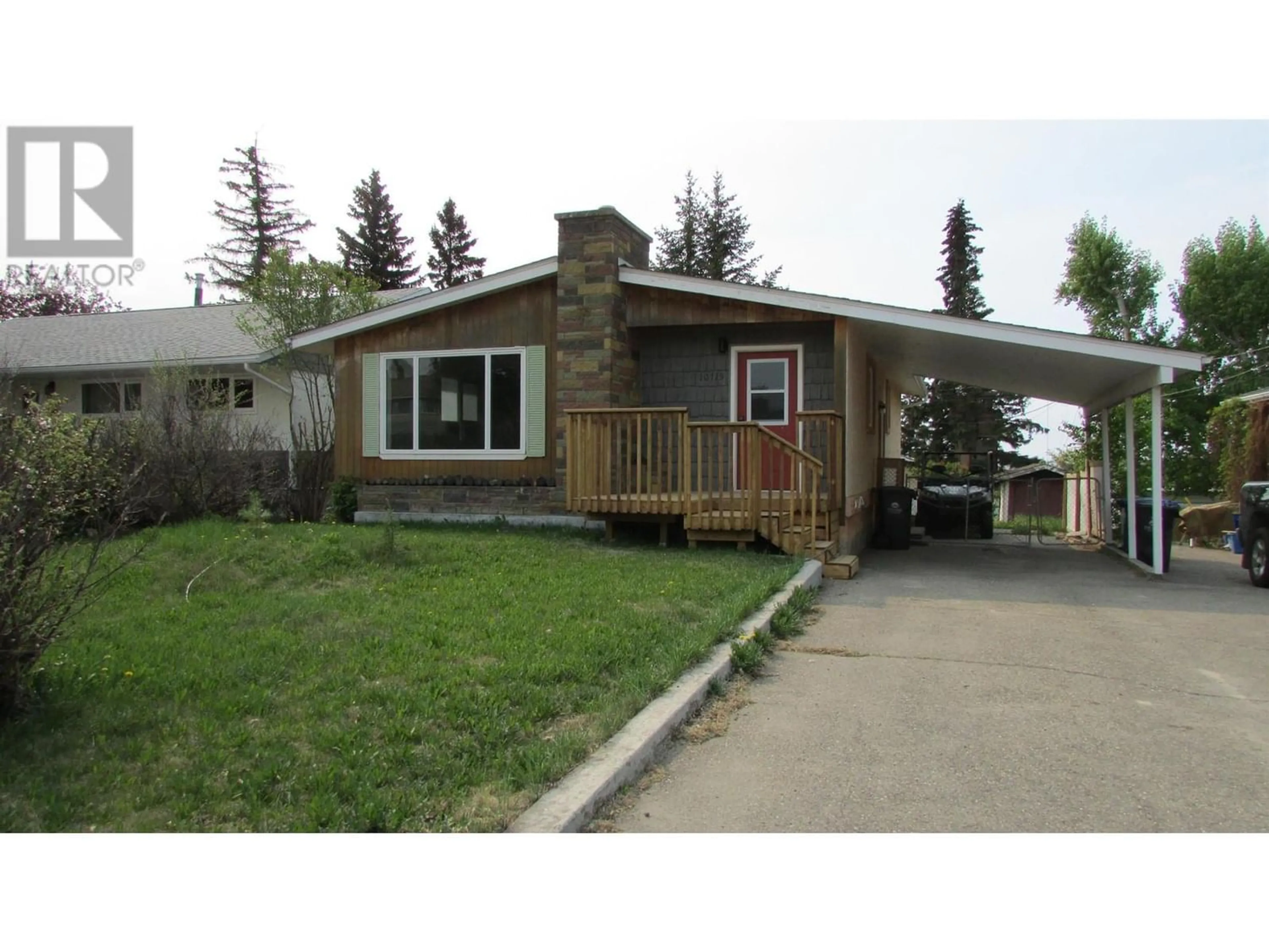 Frontside or backside of a home for 10715 103 AVENUE, Fort St. John British Columbia V1J2J2