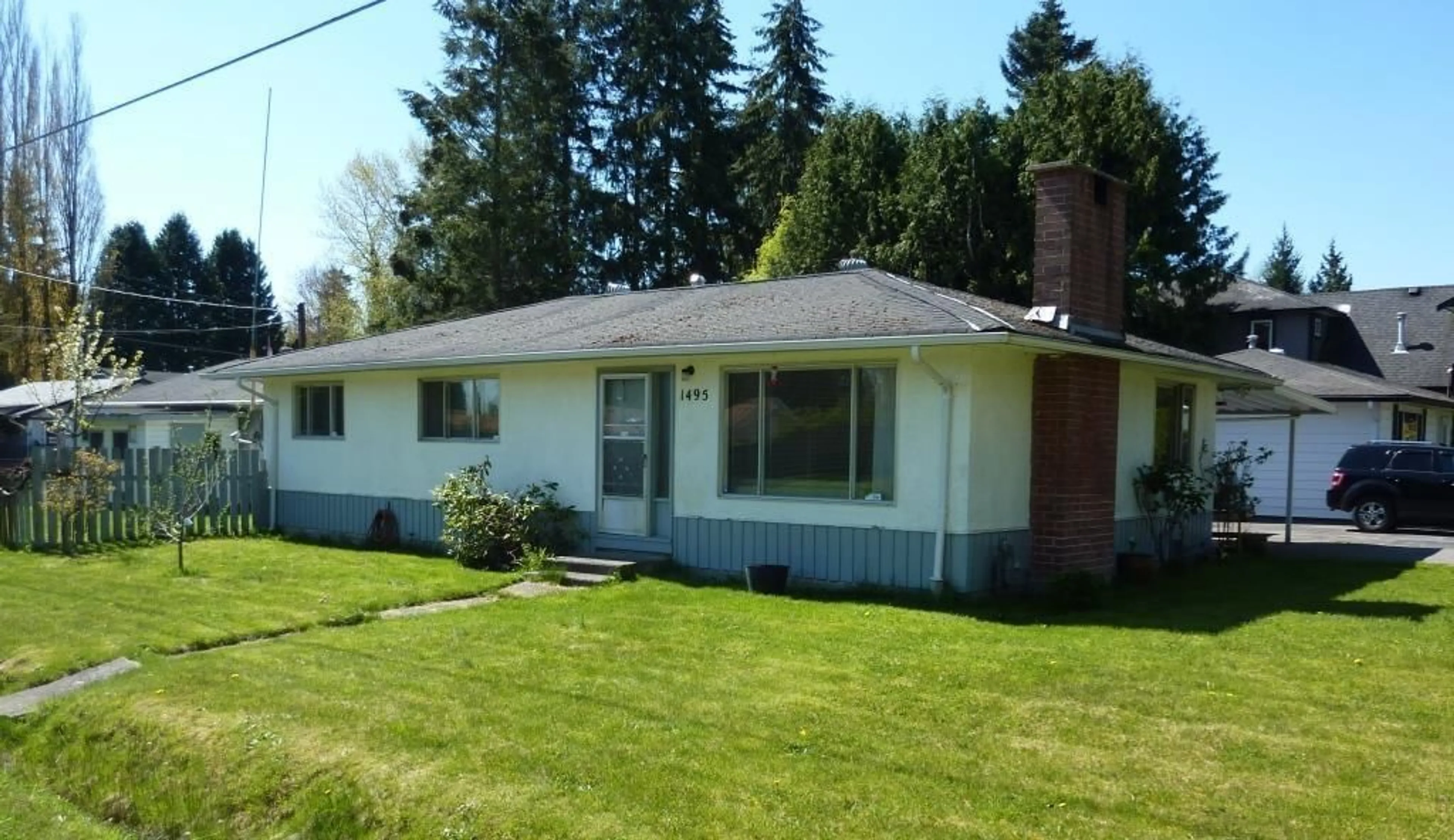 Frontside or backside of a home for 1495 164 STREET, Surrey British Columbia V4A4Y8