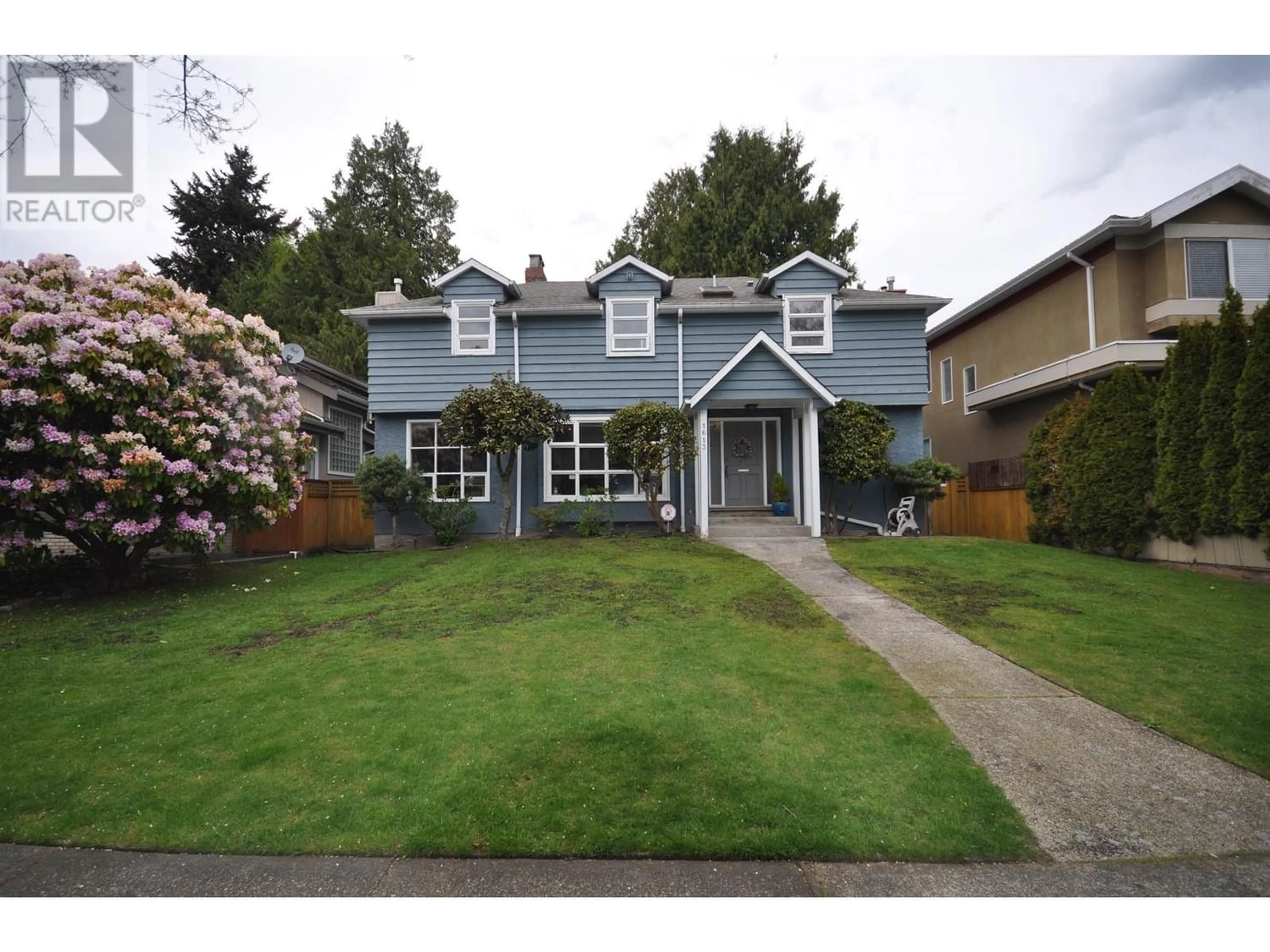 Frontside or backside of a home for 1613 W 61ST AVENUE, Vancouver British Columbia V6P2C2