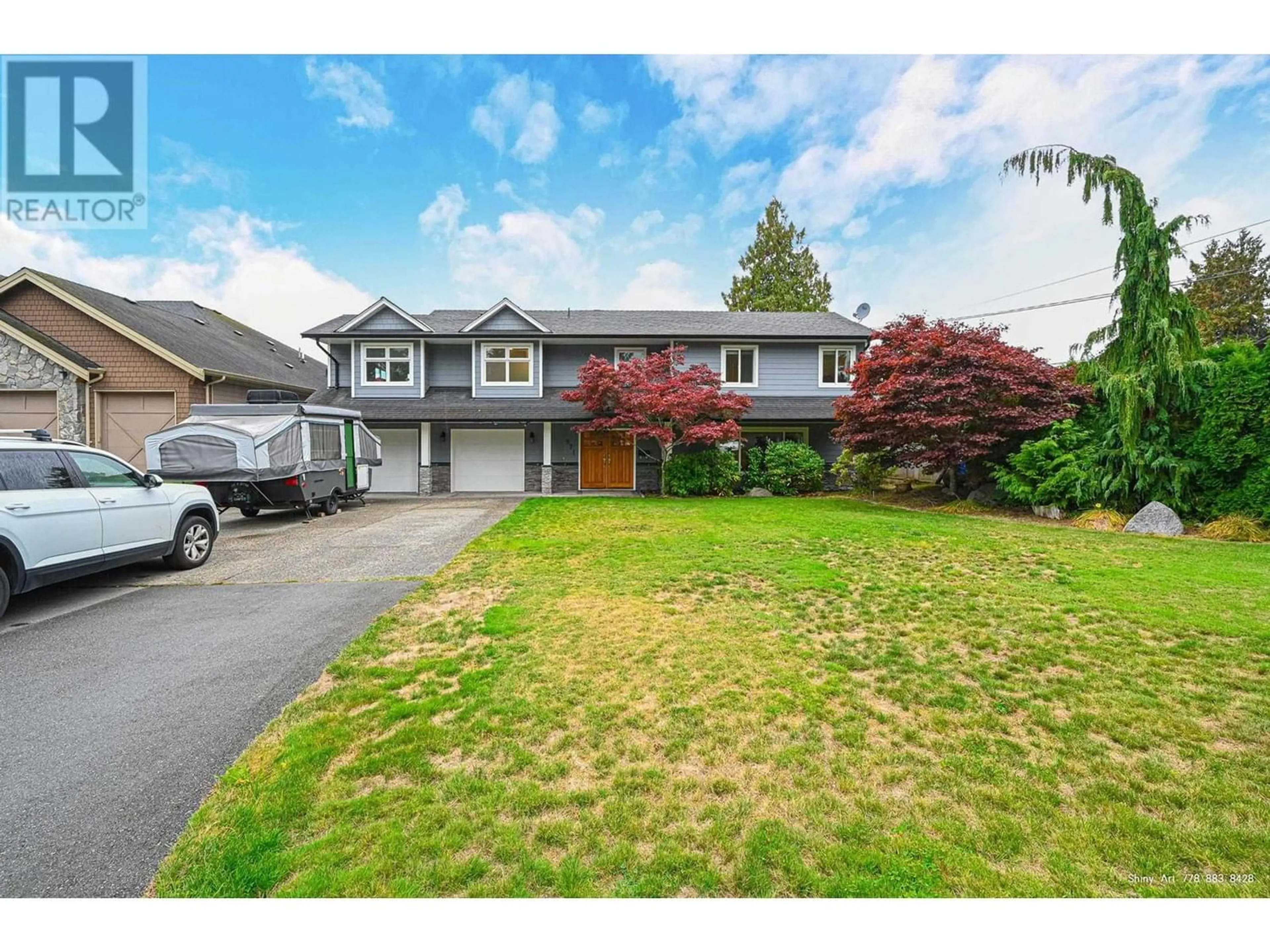 Frontside or backside of a home for 971 51A STREET, Delta British Columbia V4M2X9