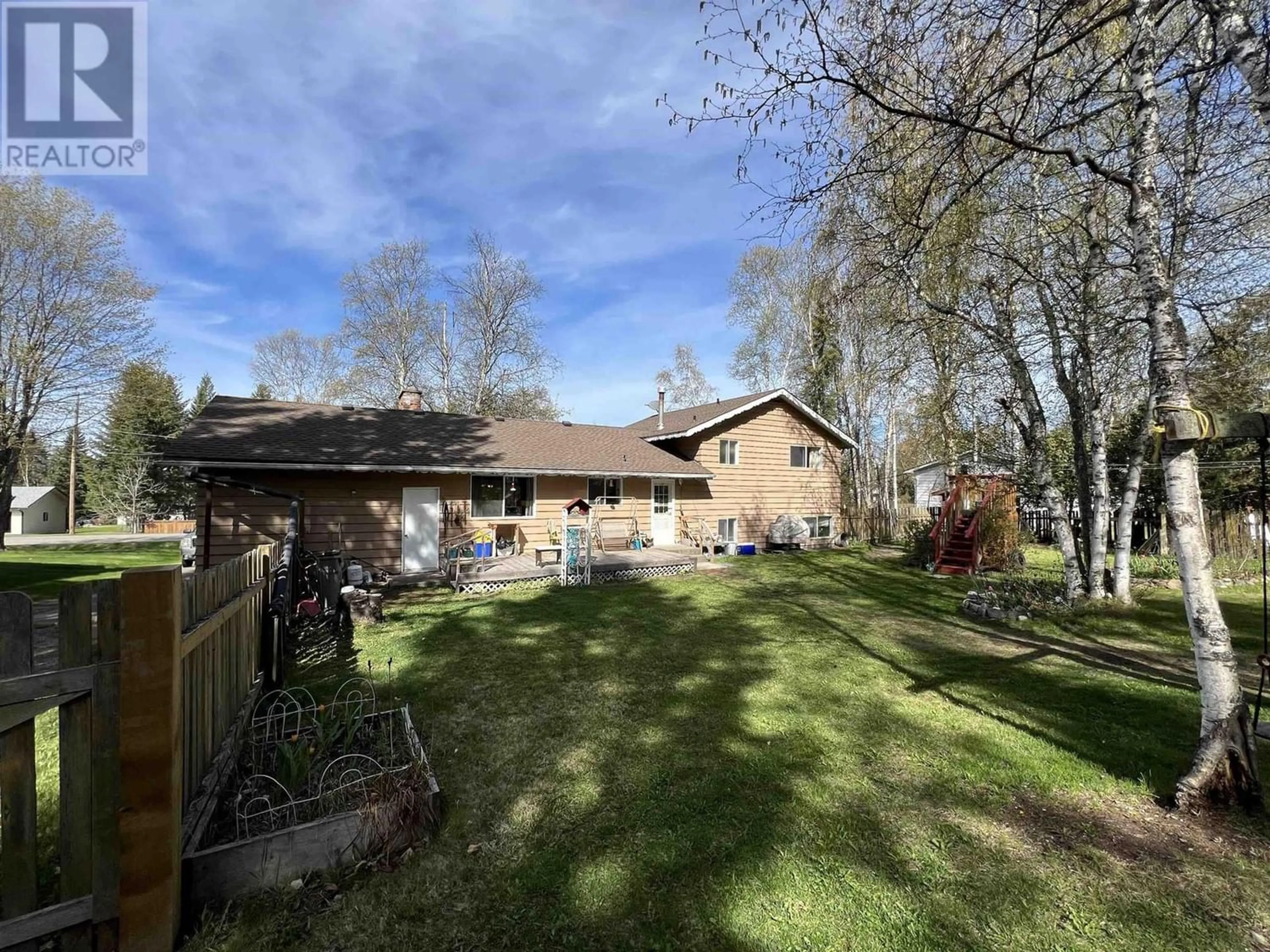 Frontside or backside of a home, the fenced backyard for 150 S ENEMARK ROAD, Quesnel British Columbia V2J4G7