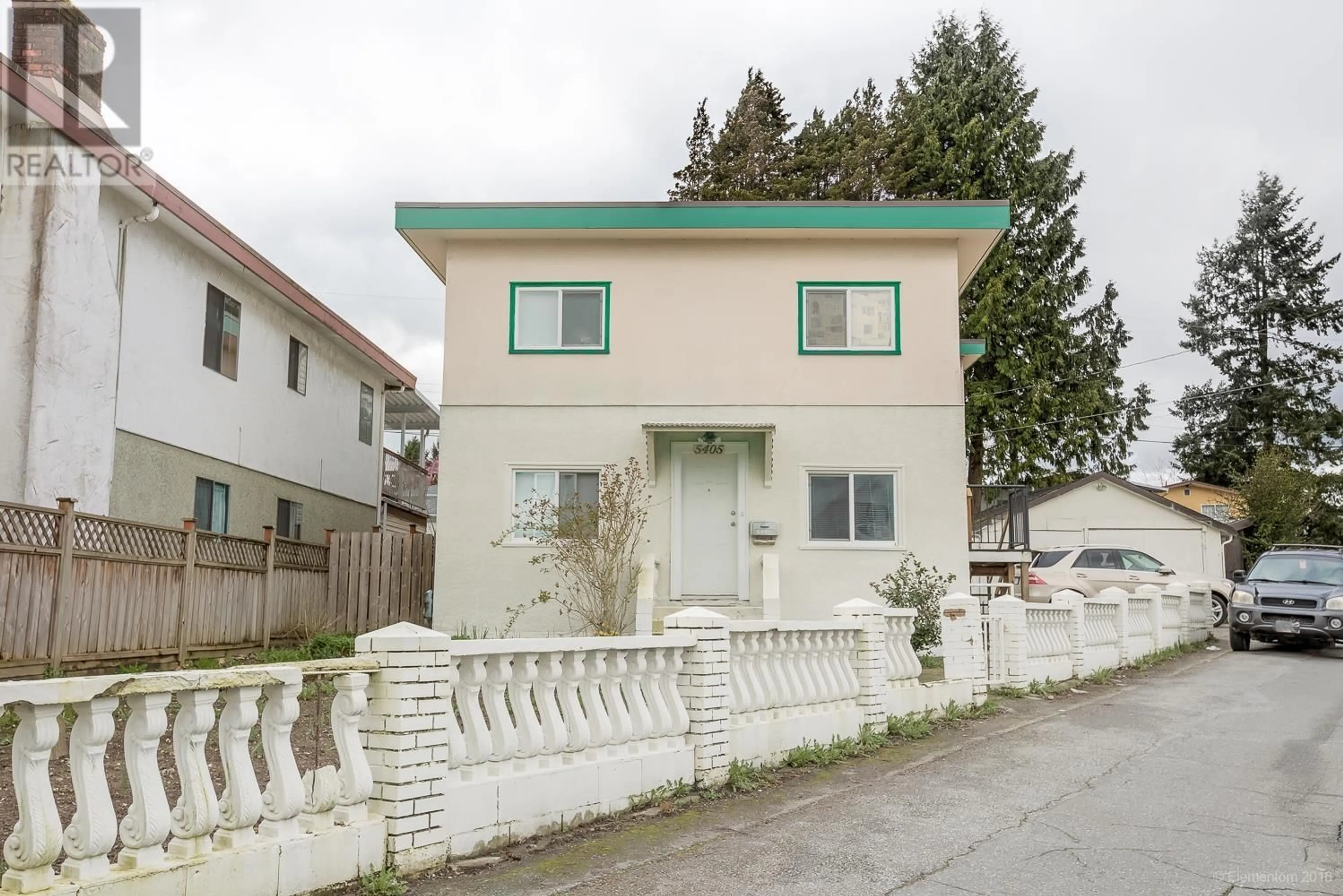Frontside or backside of a home for 5405 COLLEGE STREET, Vancouver British Columbia V5R3Z6