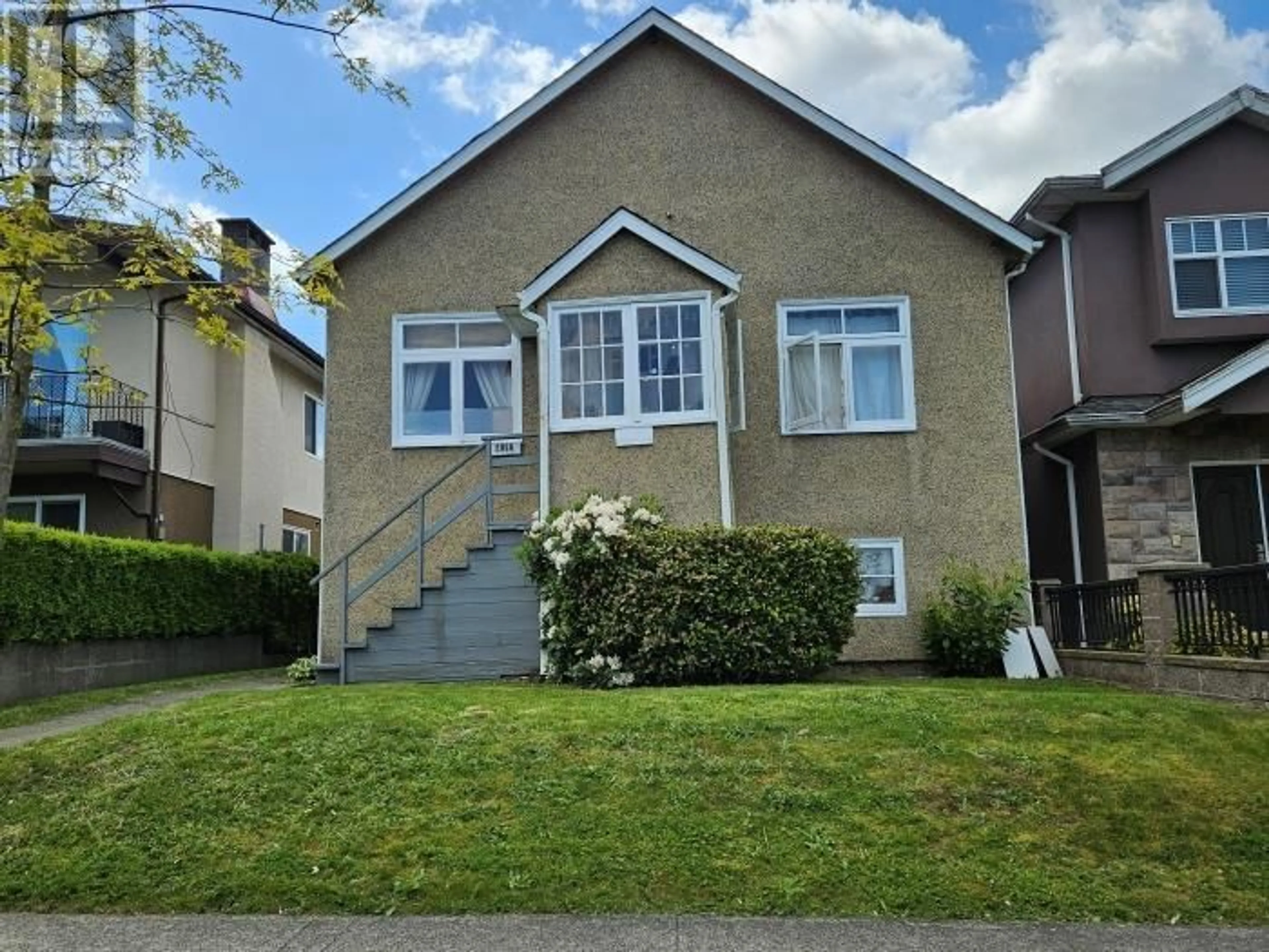 Frontside or backside of a home for 2056 E 32ND AVENUE, Vancouver British Columbia V5N3B8