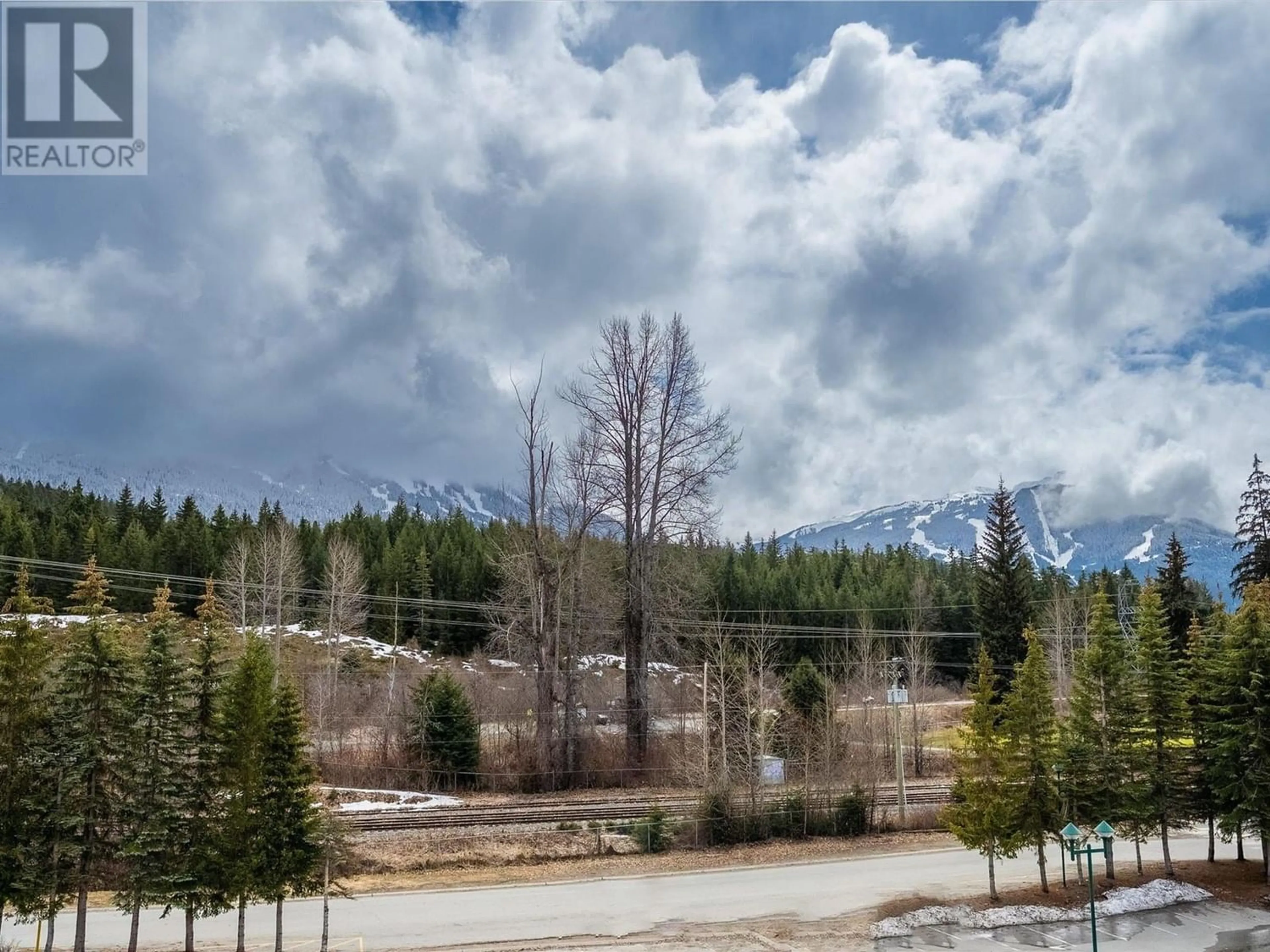 A pic from exterior of the house or condo, the view of mountain for 307 8080 NICKLAUS NORTH BOULEVARD, Whistler British Columbia V8E1J7