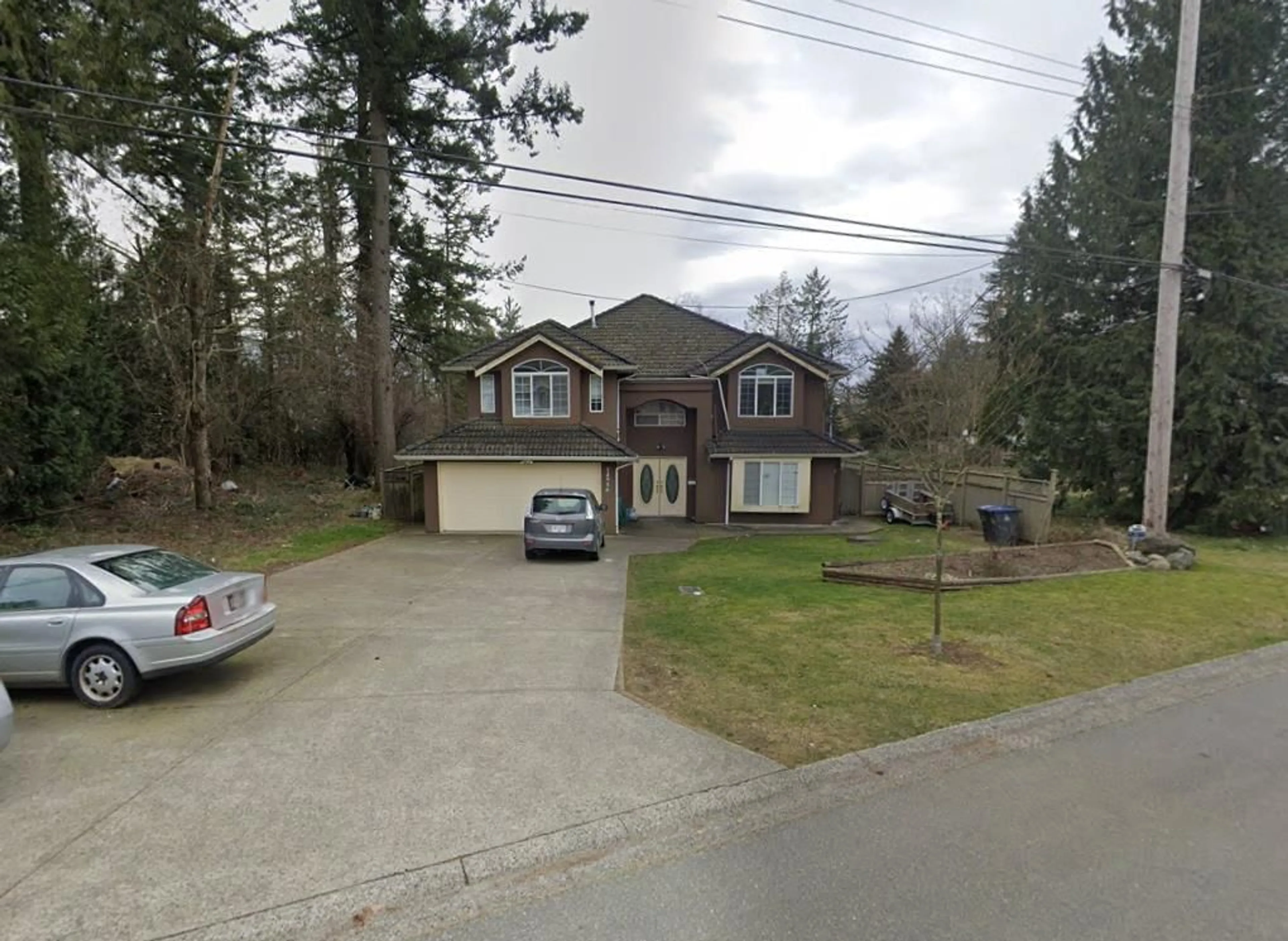 Frontside or backside of a home for 14946 92 AVENUE, Surrey British Columbia V3R1C1